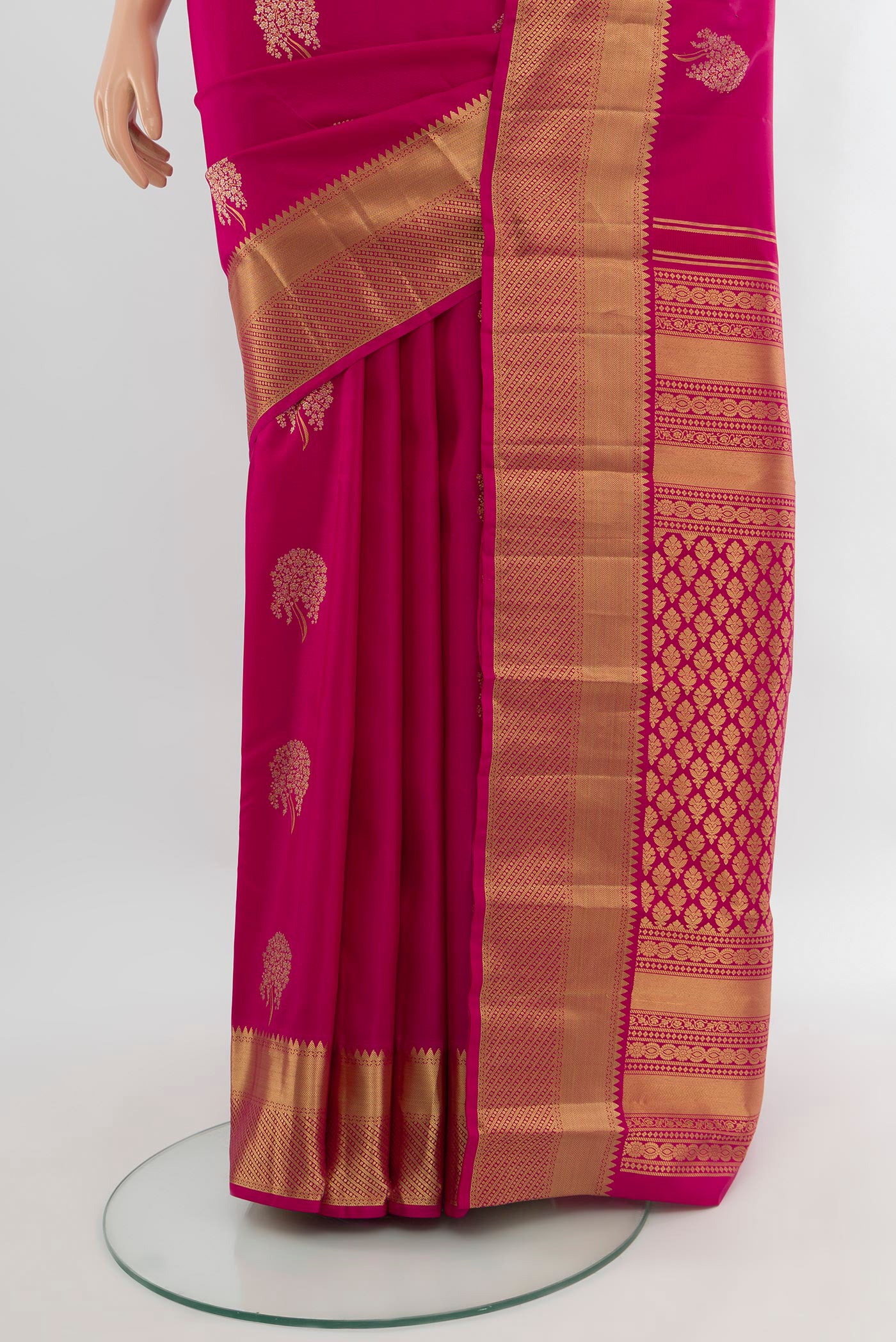 Pleats and pallu of Pink Kanjivaram Silk Saree with Zari Butta on the body and Zari Border. 