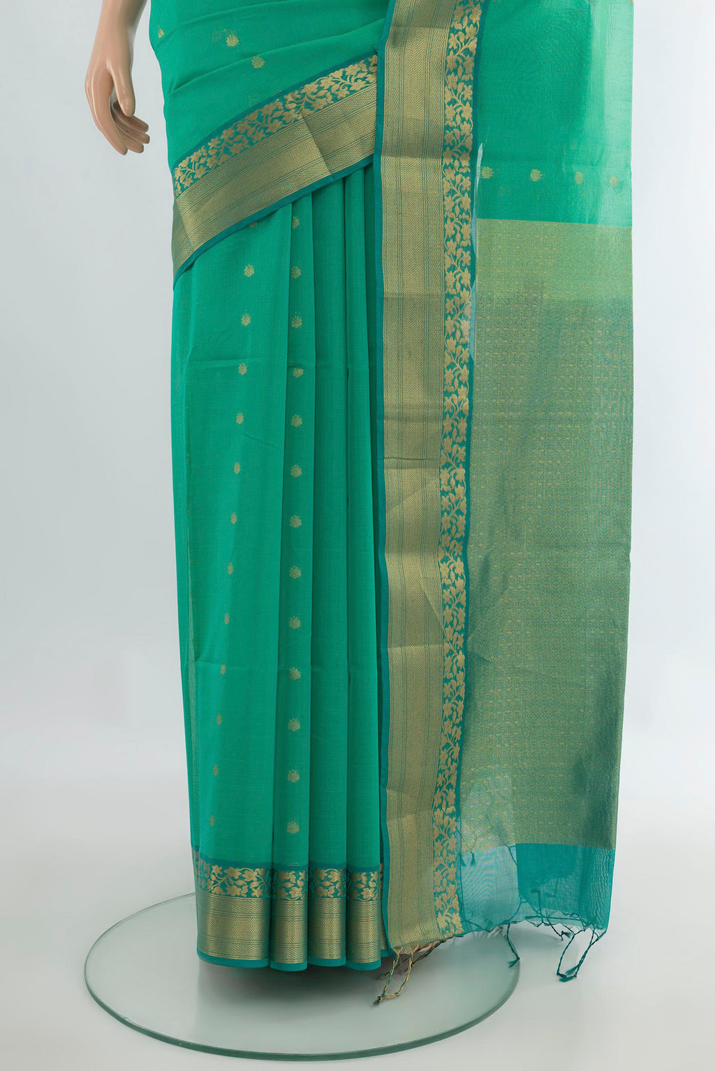 Pleats and pallu of Sea Green Silk Cotton Saree with Zari Butta on the body and Zari Border. 