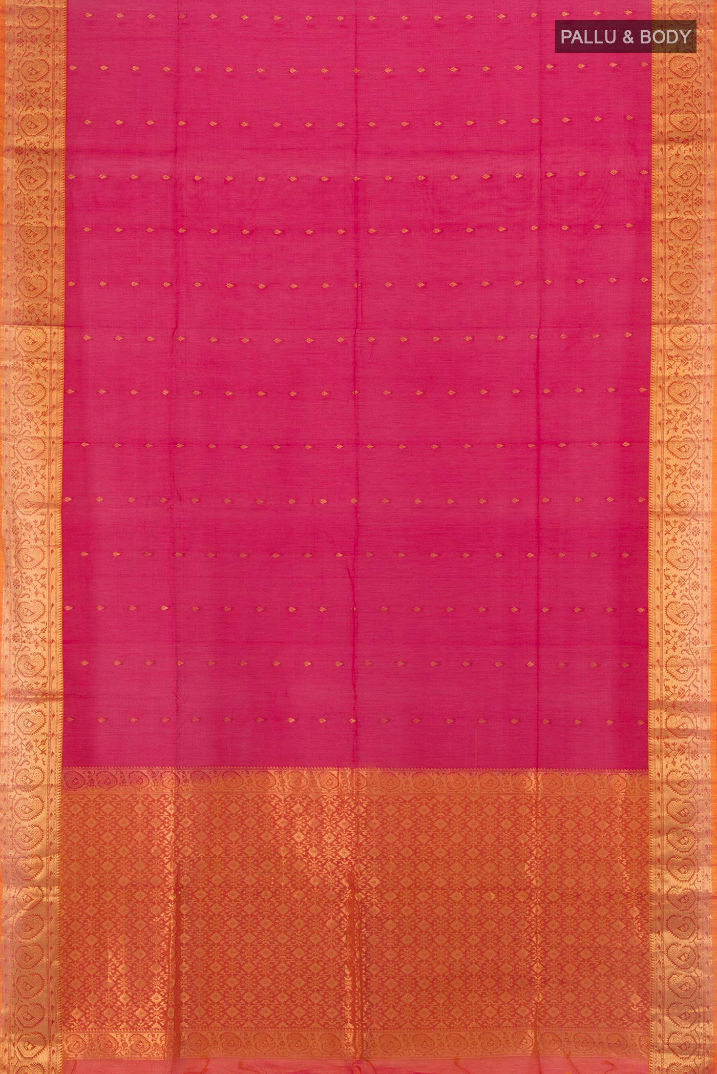 Flat view of Dark Pink Silk Cotton Saree with Zari Butta on the body and Zari Border. 