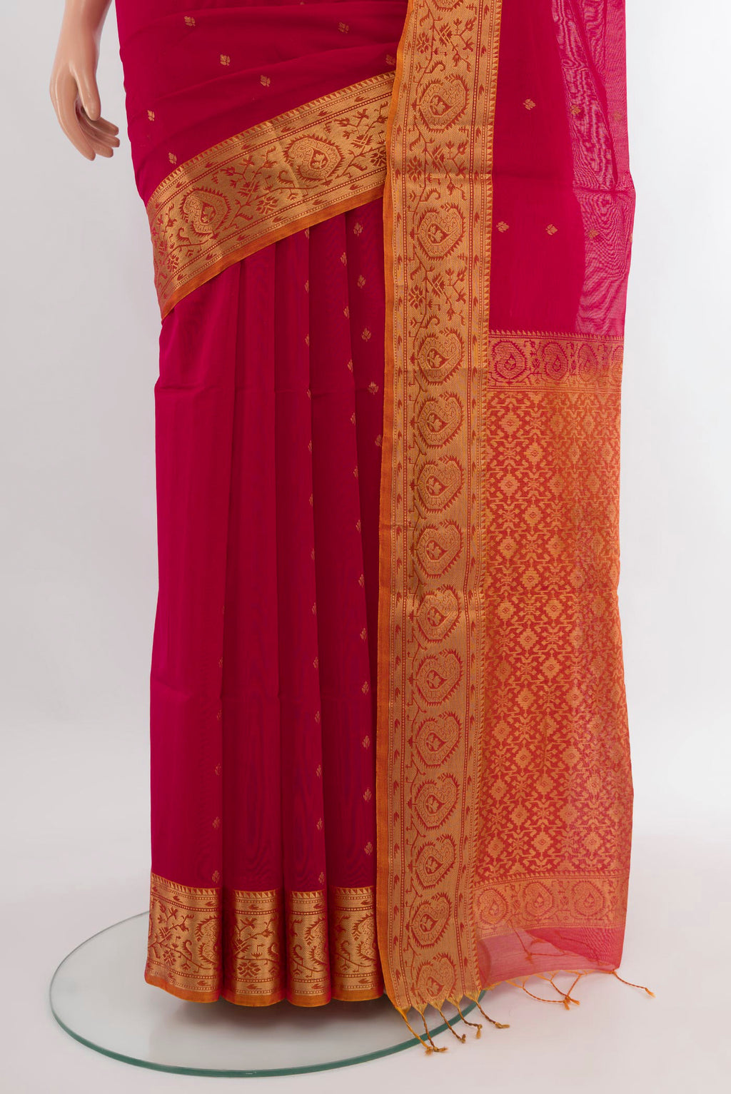 Pleats and pallu of Dark Pink Silk Cotton Saree with Zari Butta on the body and Zari Border. 