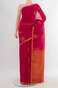 Dark Pink Silk Cotton Saree with Zari Butta on the body and Zari Border.  displayed on a mannequin