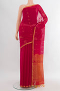 Dark Pink Silk Cotton Saree with Zari Butta on the body and Zari Border.  displayed on a mannequin