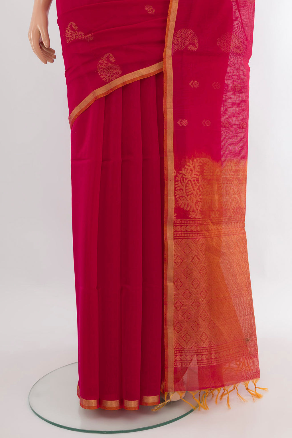 Pleats and pallu of Dark Pink Silk Cotton Saree with Zari Butta on the body and Zari Border. 