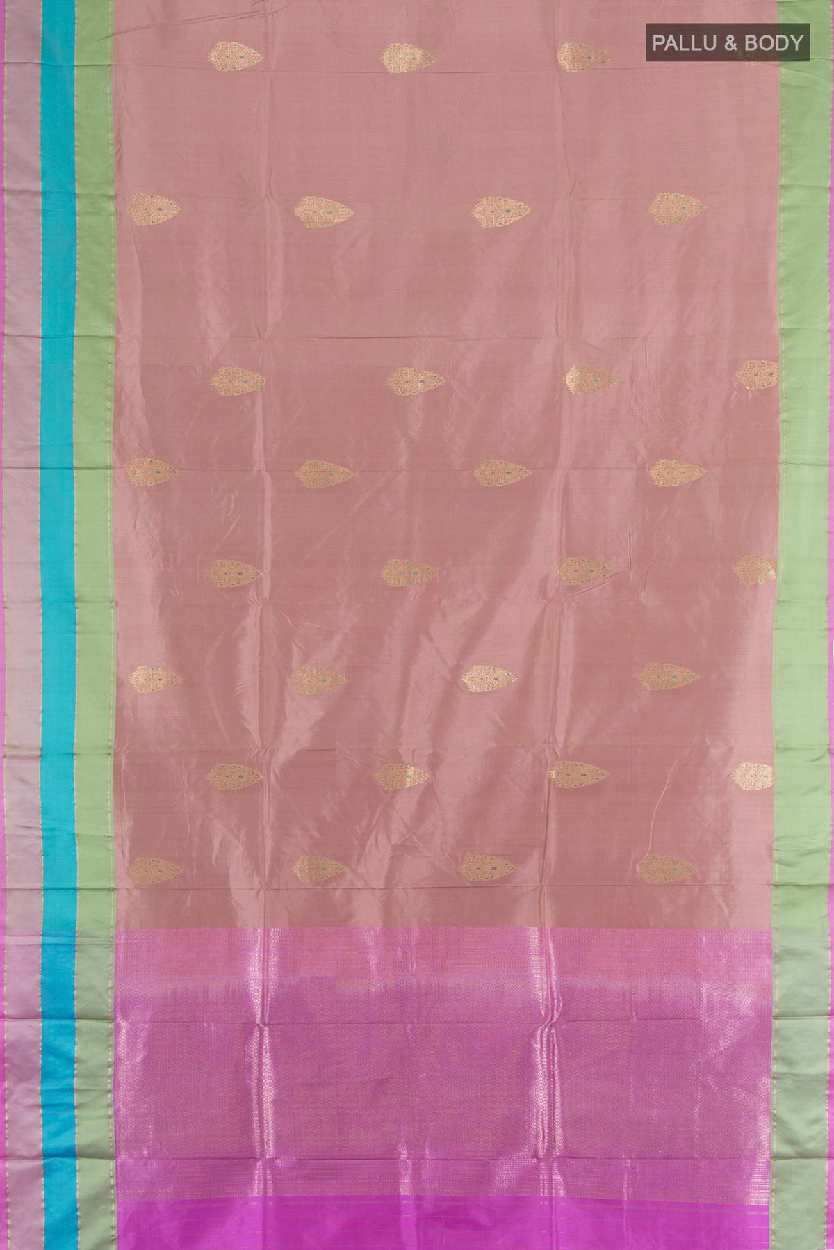 Flat view of Pure Silk Rose Gold Banarasi Katan Saree with Zari Butta on the body and Zari Border. 