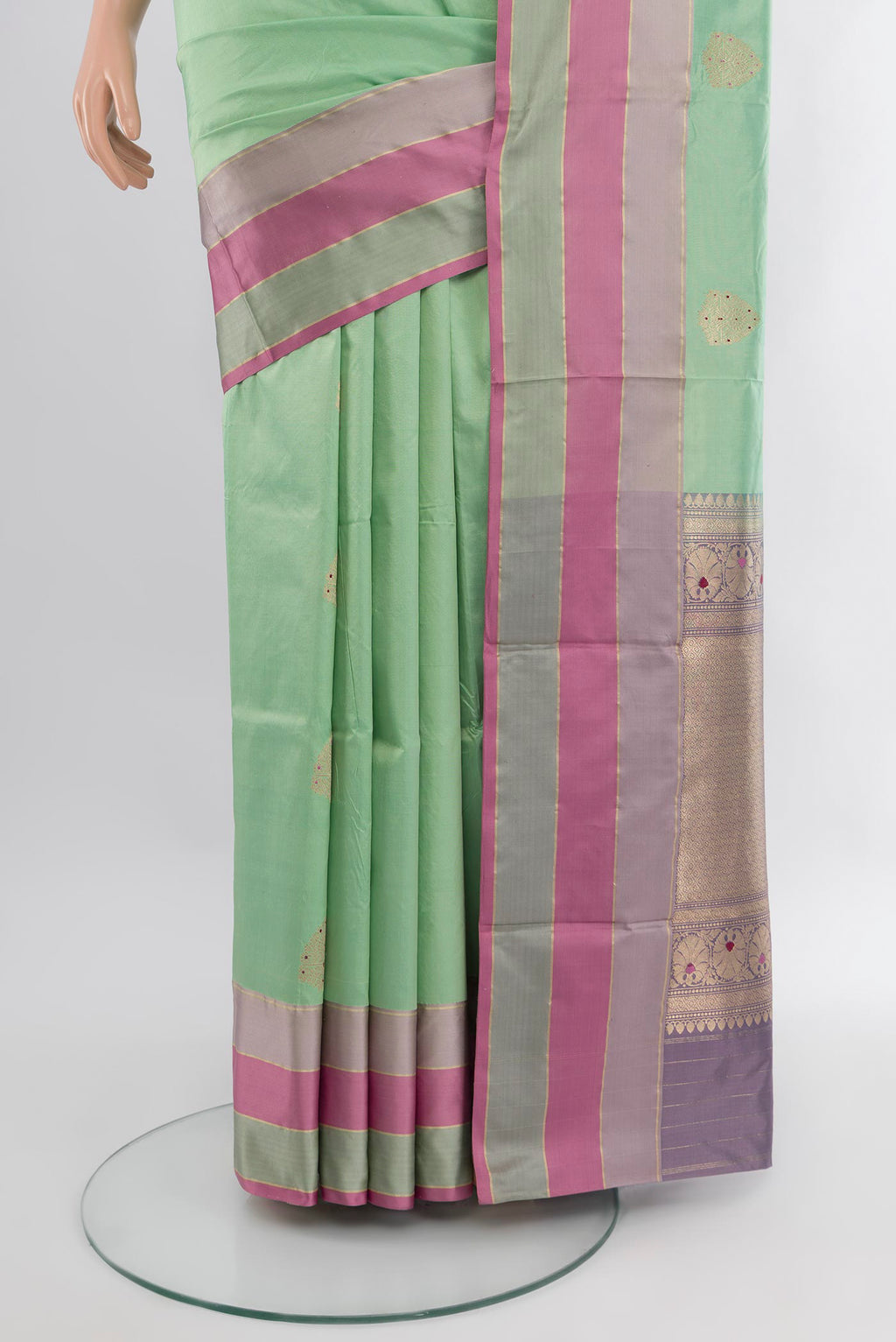 Pleats and pallu of Mint Green Banarasi Katan Silk Saree with Zari Butta on the body and Zari Border. 