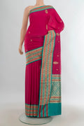 Pure Silk Pink Banarasi Katan Saree with Zari Butta on the body and Zari Border.  displayed on a mannequin