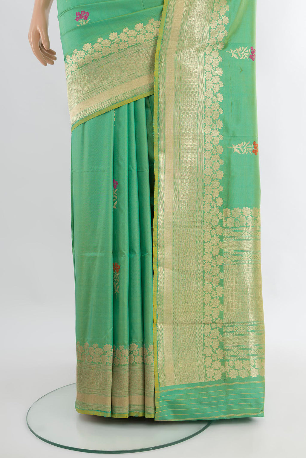Pleats and pallu of Light Green Banarasi Katan Silk Saree with Zari Butta on the body and Zari Border. 