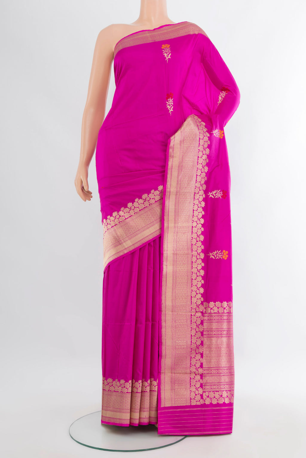 Rani Pink Banarasi Katan Silk Saree with Zari Butta on the body and Zari Border.  displayed on a mannequin