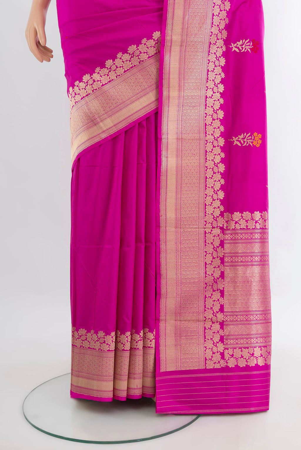 Pleats and pallu of Rani Pink Banarasi Katan Silk Saree with Zari Butta on the body and Zari Border. 