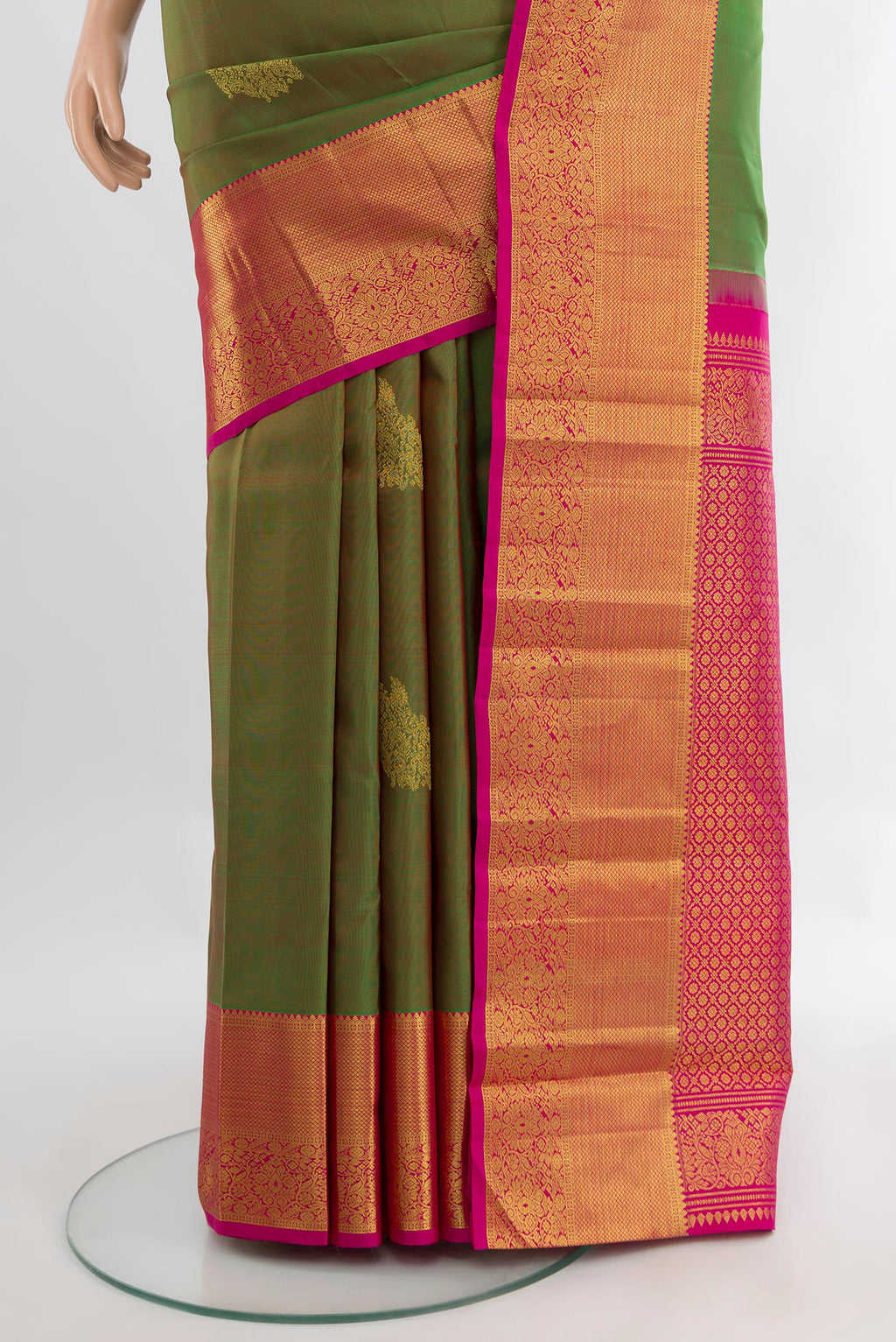 Pleats and pallu of Pure Silk Pure Zari Light Green Kanjivaram Saree with Zari Butta on the body and Silk Border. 