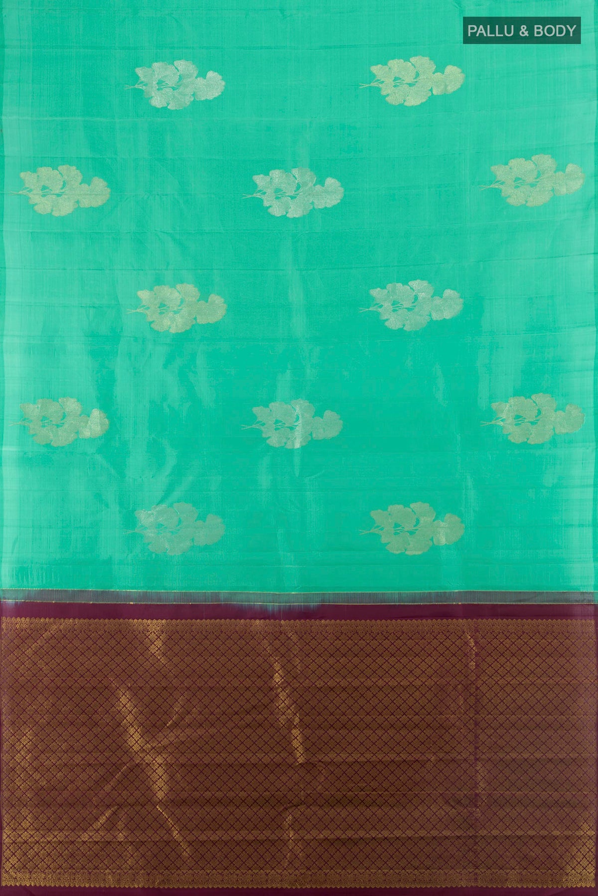 Flat view of Pure Silk Green Kanjivaram Saree with Zari Butta on the body and Without Border. 