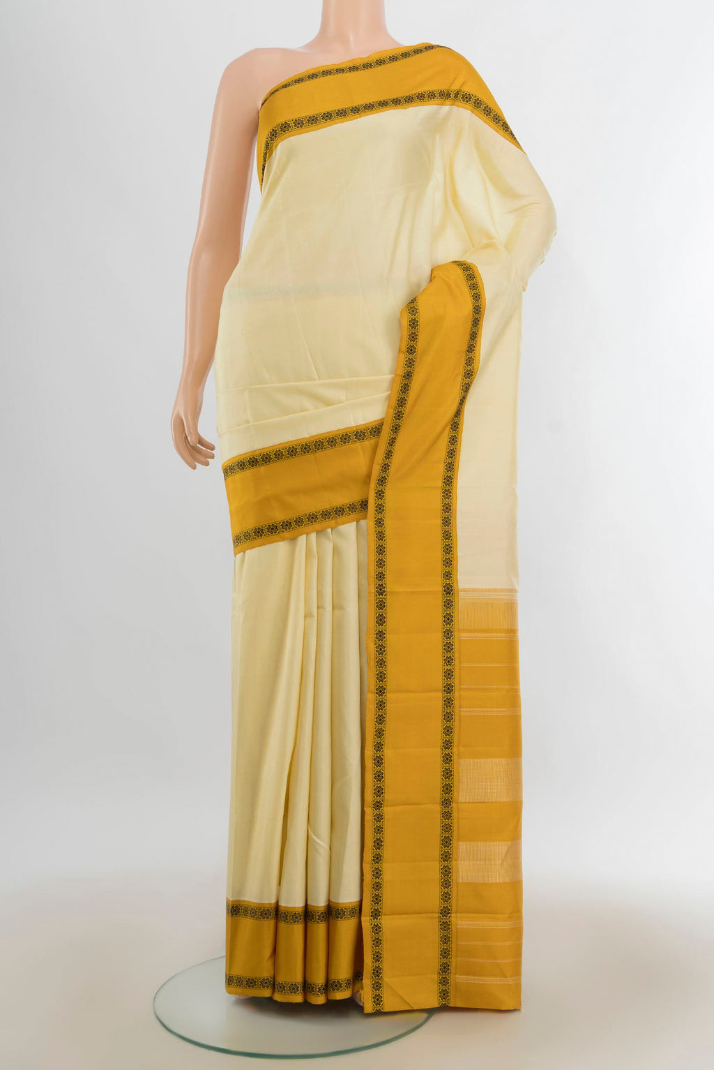 Pure Silk Cream Kanjivaram Saree with Plain Body and Silk Border.  displayed on a mannequin