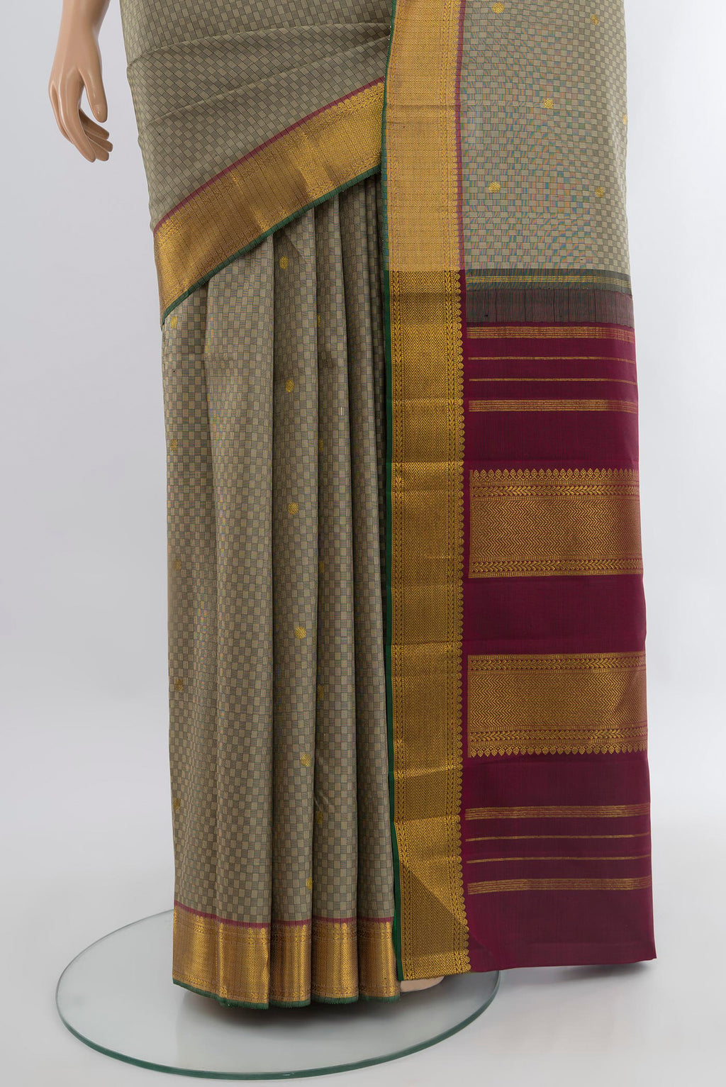 Pleats and pallu of Grey Kanchipuram Silk Saree with Jacquard With Zari Butta on the body and Zari Border. 