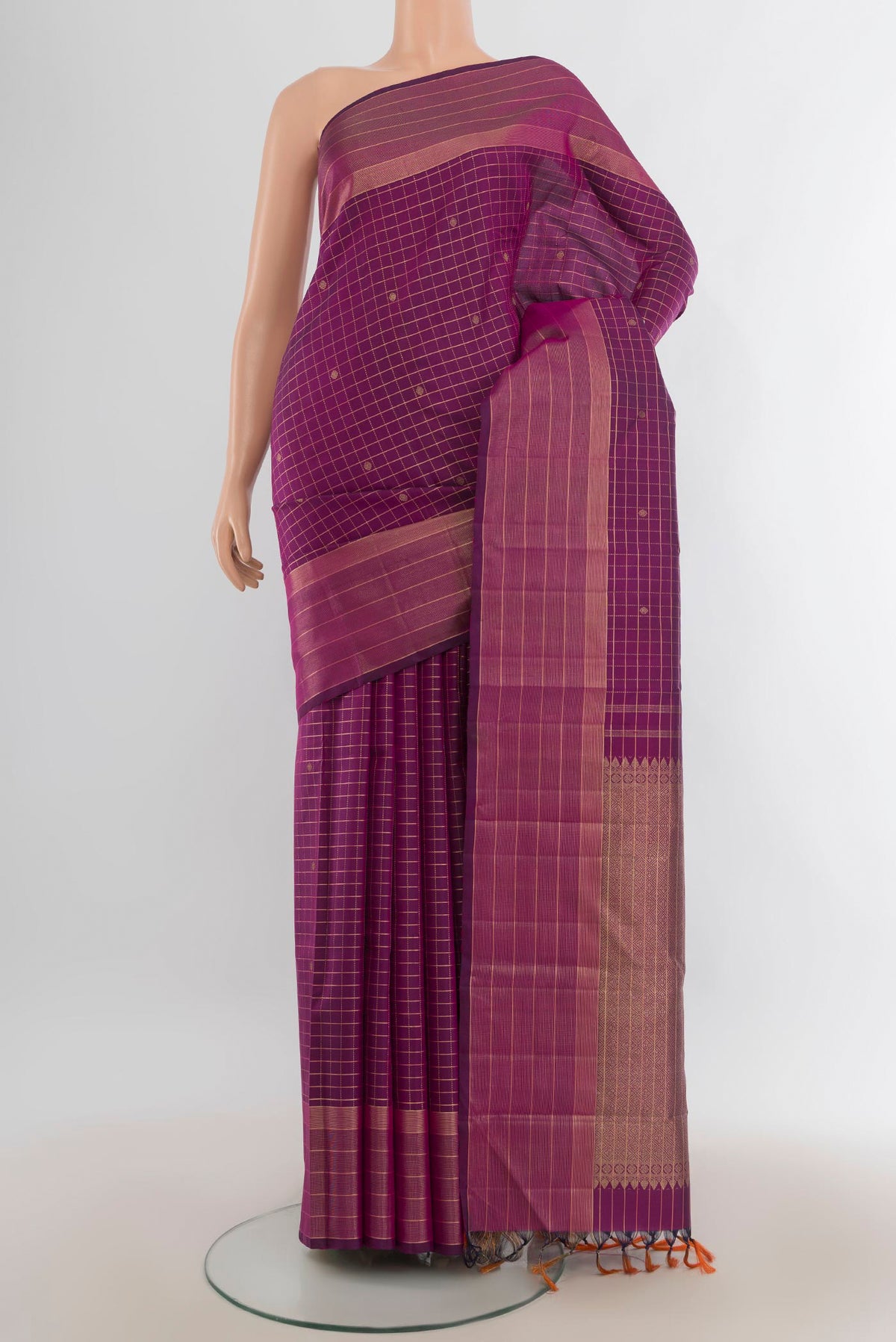Pure Silk Purple Kanchipuram Saree with Checked design on the body and Silk Border.  displayed on a mannequin