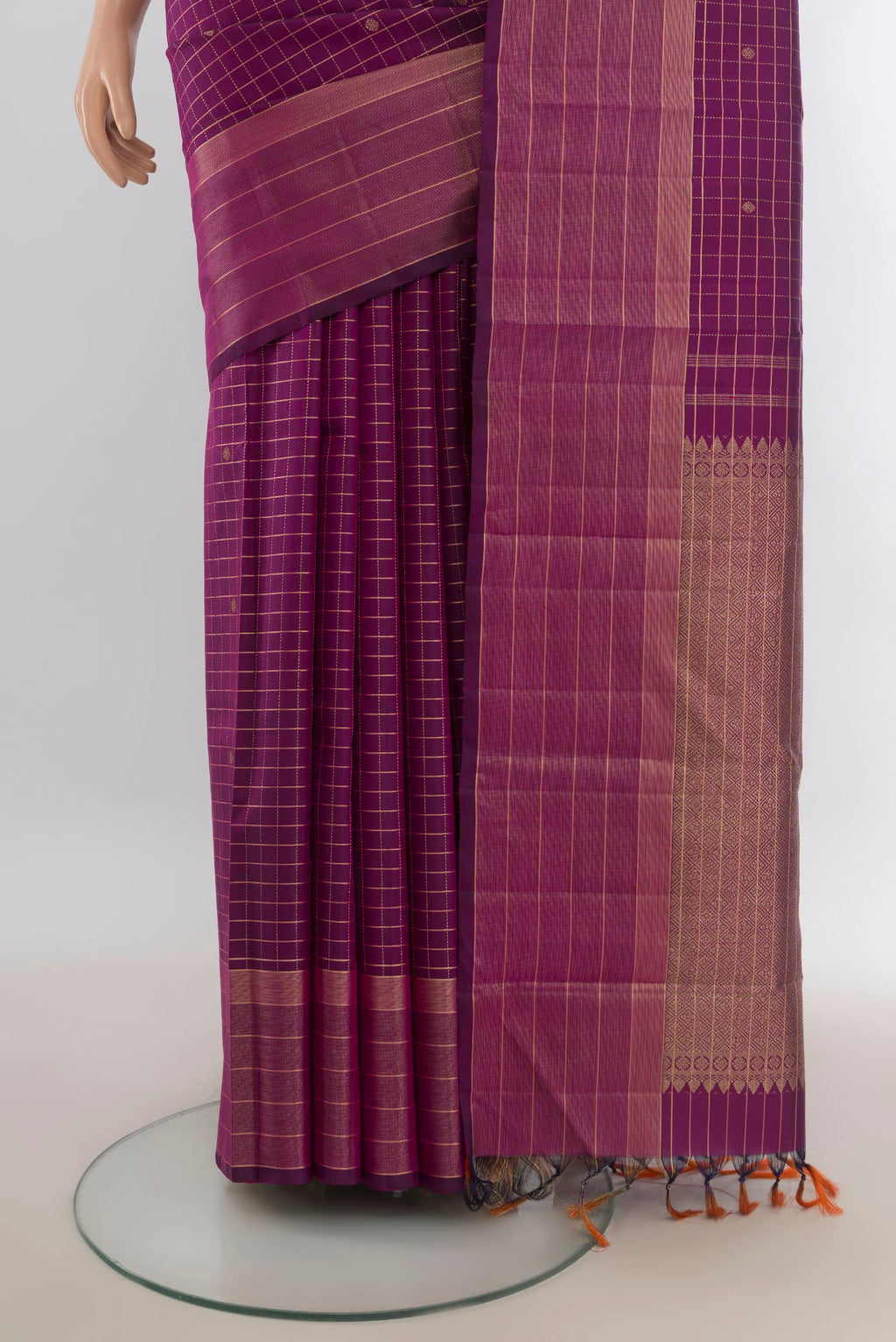 Pleats and pallu of Pure Silk Purple Kanchipuram Saree with Checked design on the body and Silk Border. 
