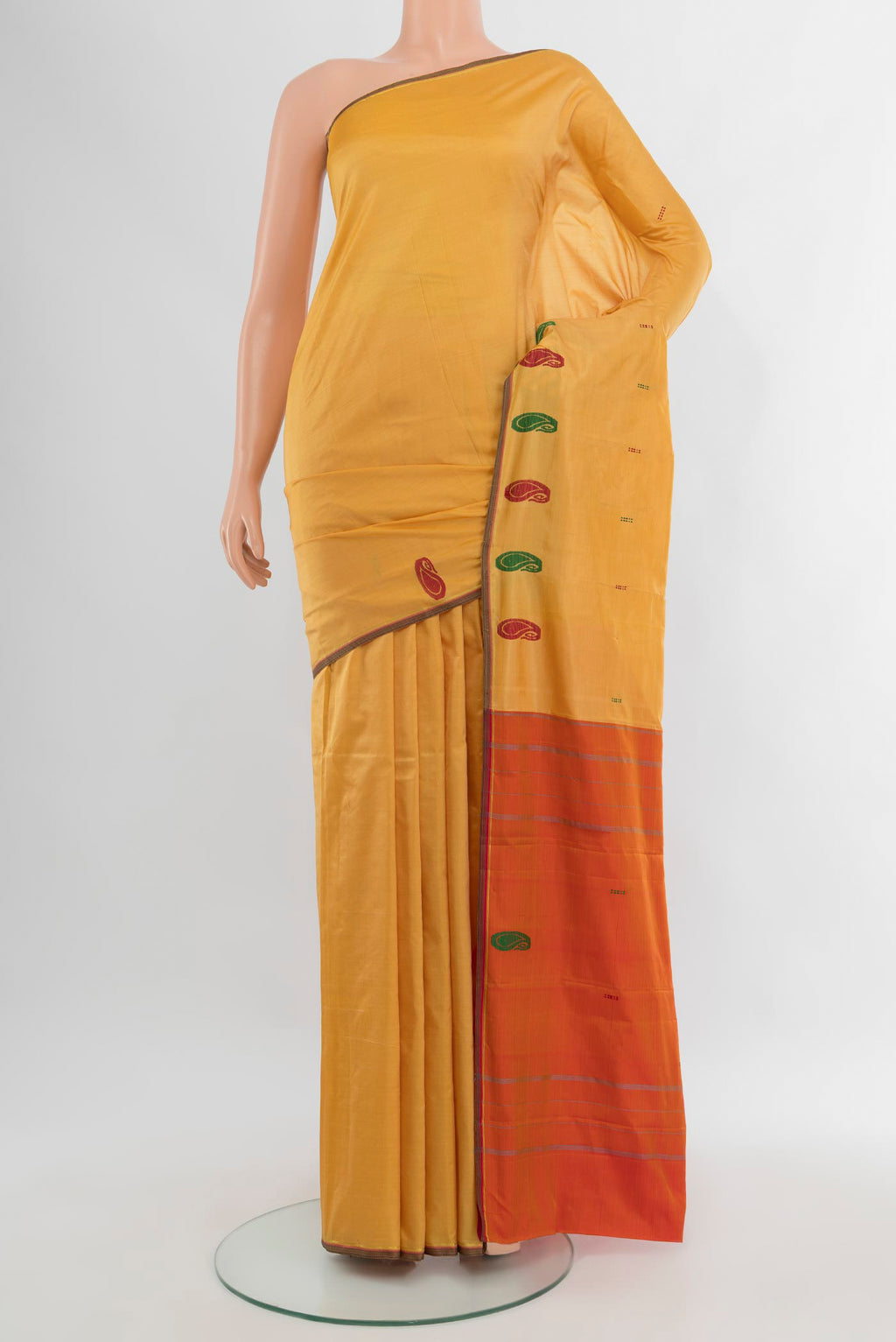 Sandal Kanchipuram Silk Saree with Plain Body and Thread Border.  displayed on a mannequin
