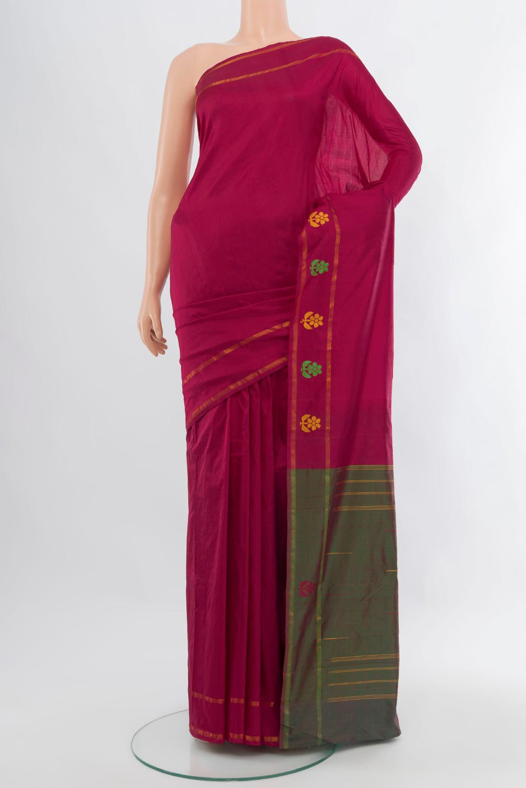 Dark Pink Kanchipuram Silk Saree with Plain Body and Zari Border.  displayed on a mannequin