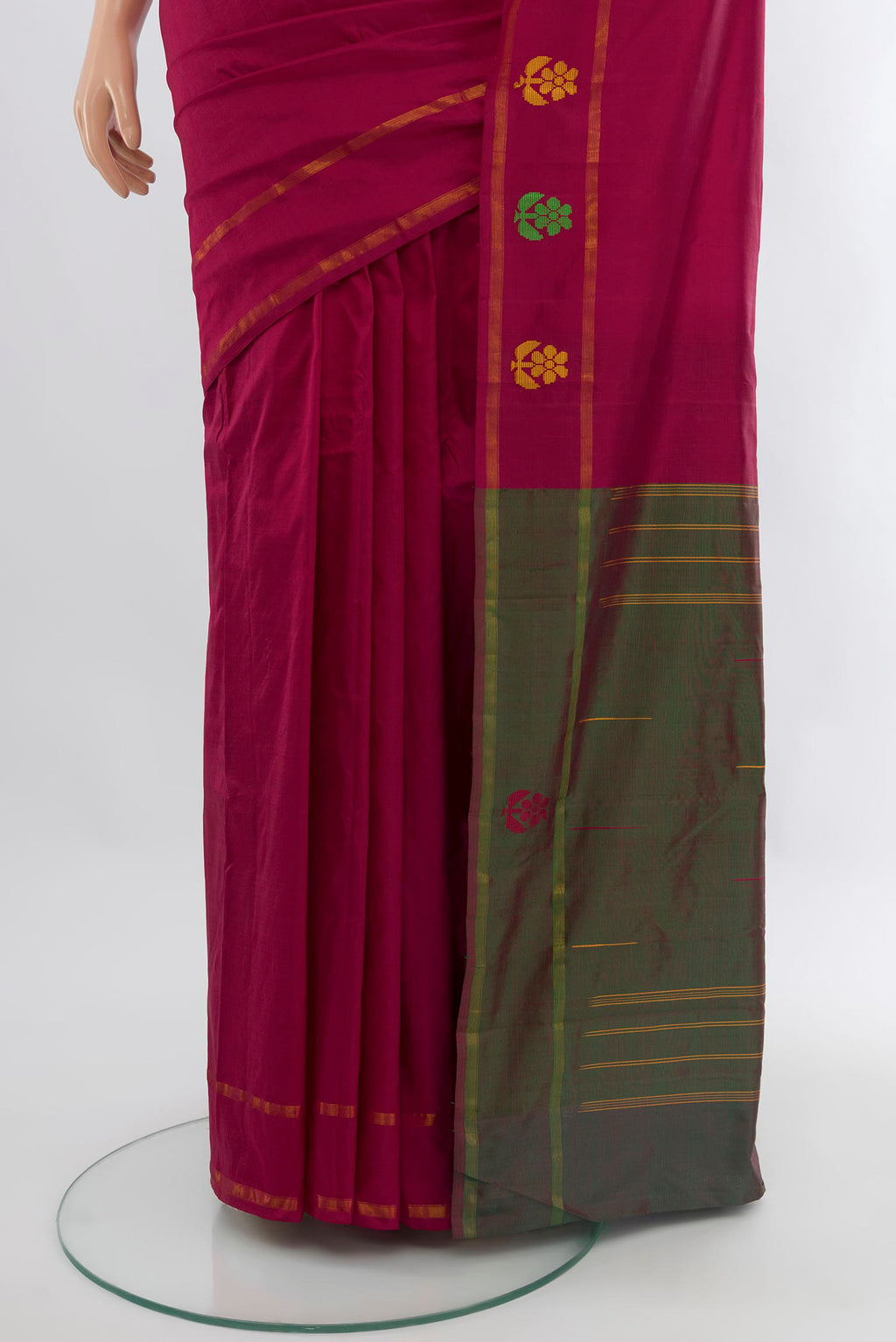 Pleats and pallu of Dark Pink Kanchipuram Silk Saree with Plain Body and Zari Border. 