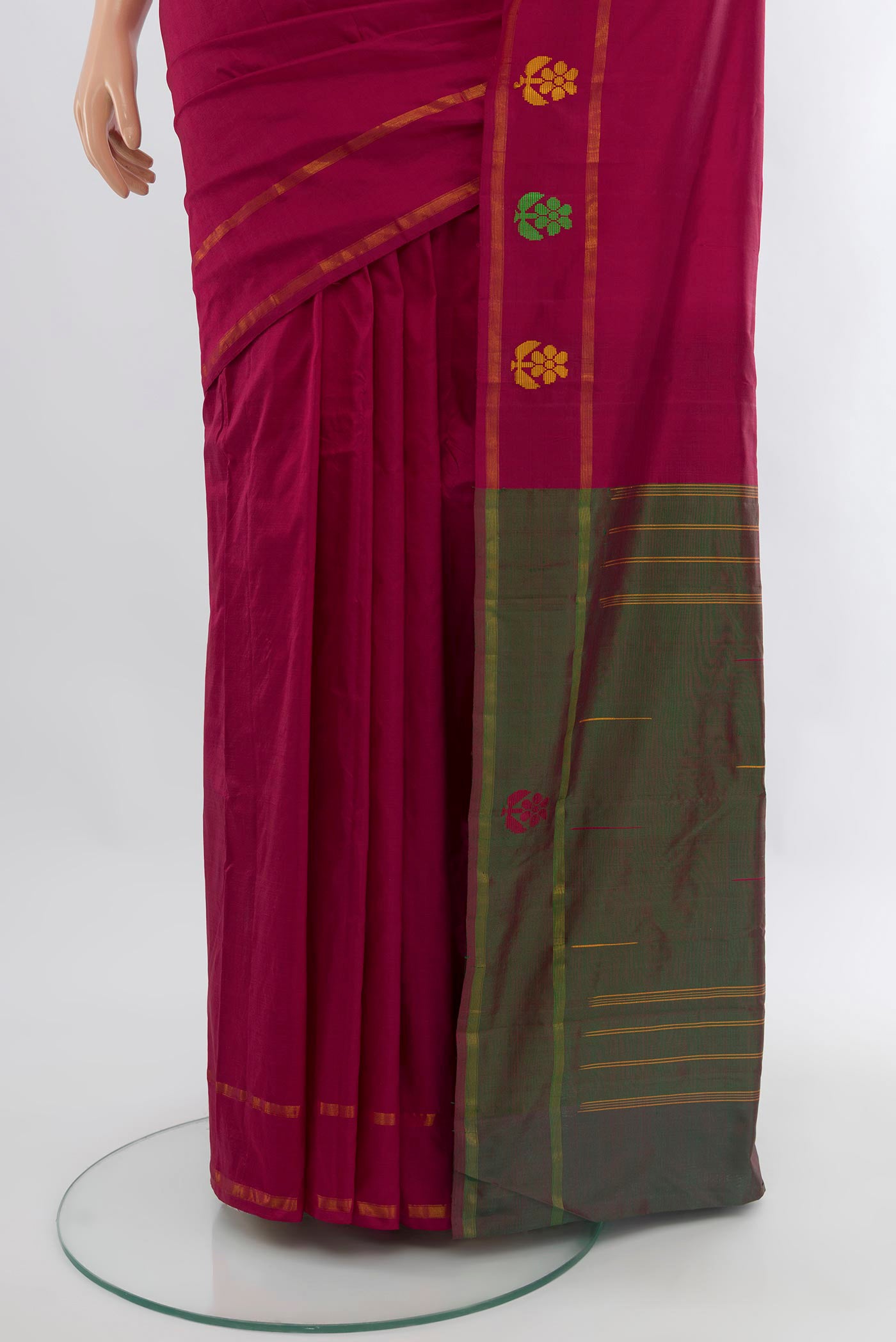 Pleats and pallu of Dark Pink Kanchipuram Silk Saree with Plain Body and Zari Border. 