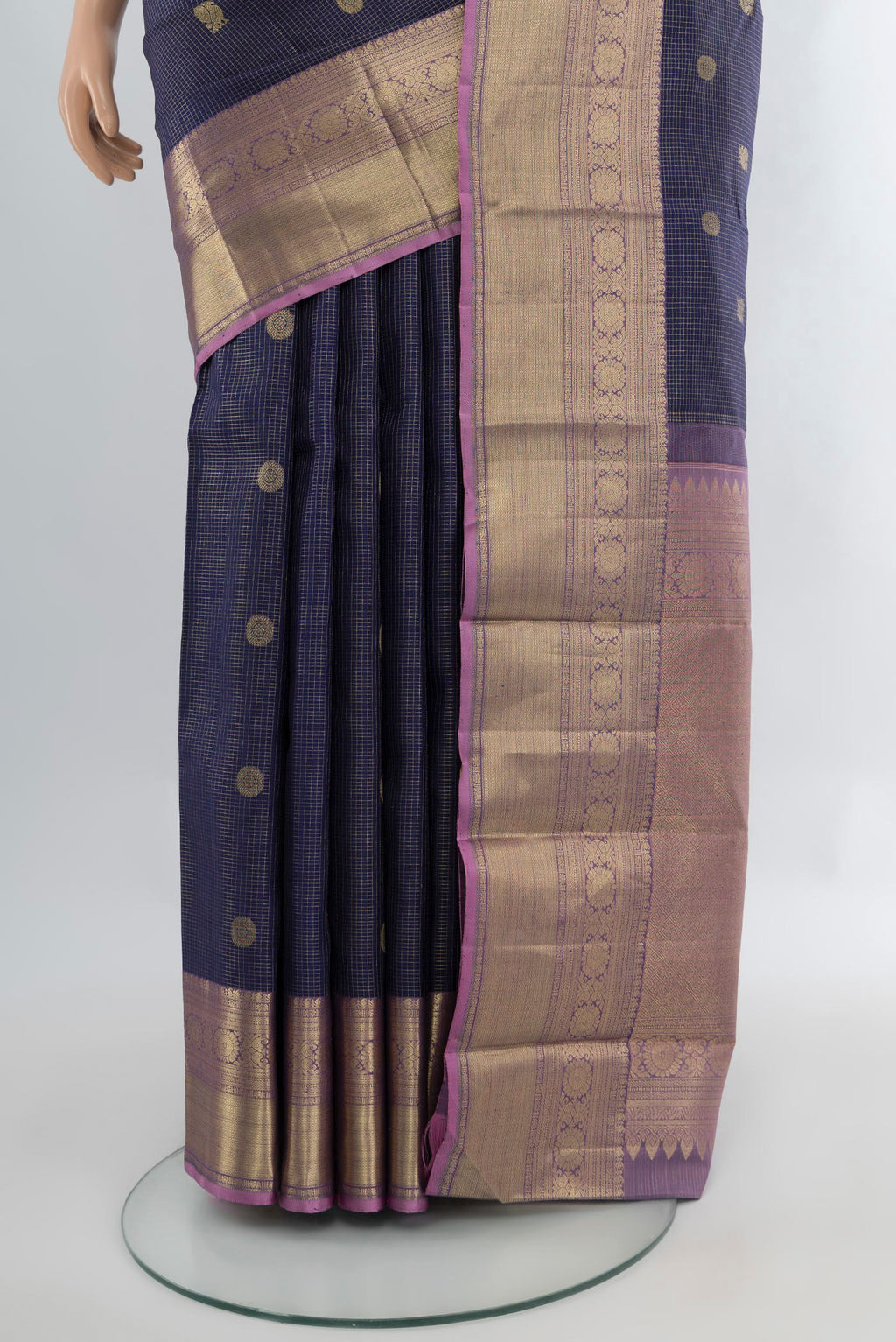 Pleats and pallu of Navy Blue Kanjivaram Silk Saree with Zari Butta on the body and Zari Border. 