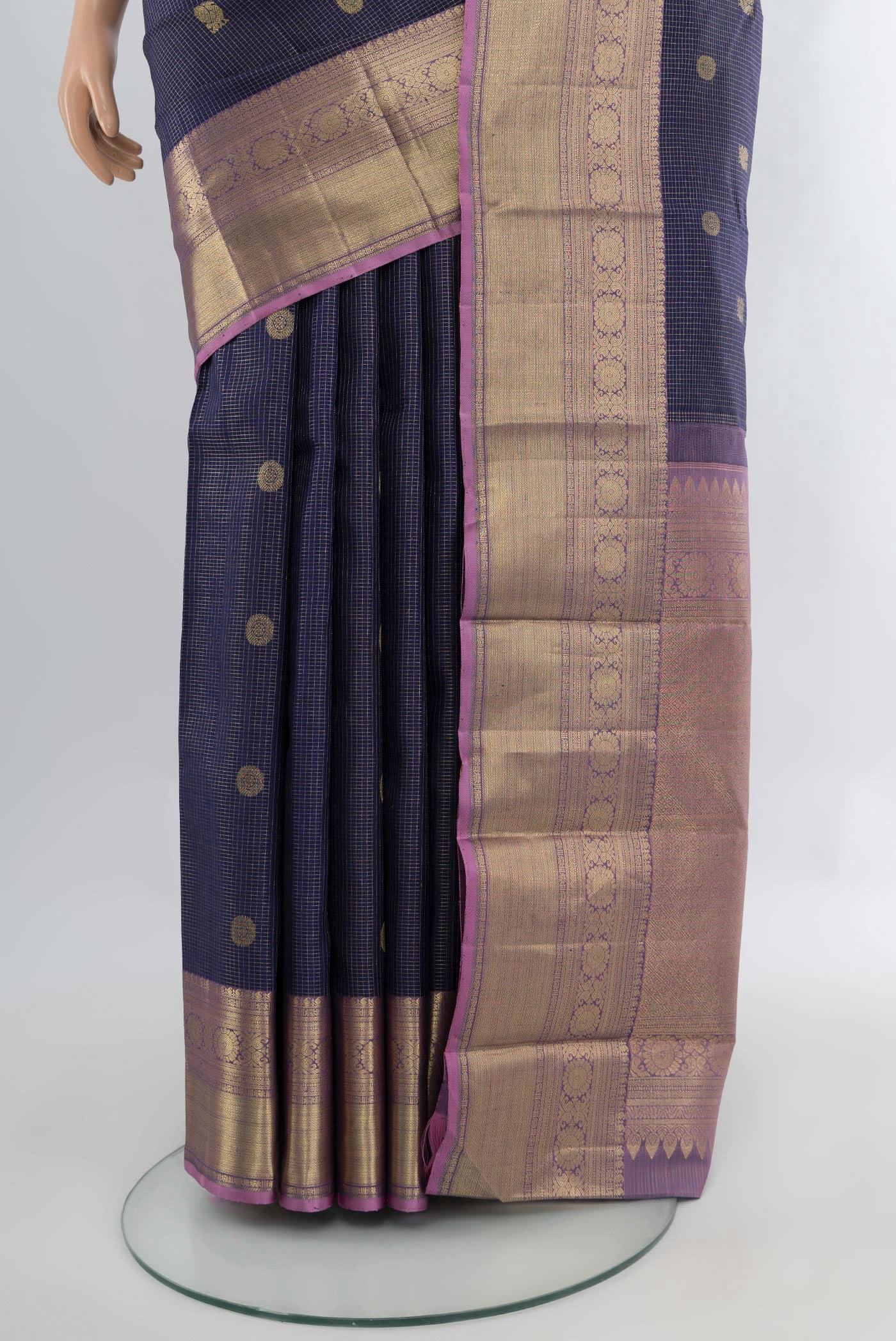Pleats and pallu of Navy Blue Kanjivaram Silk Saree with Zari Butta on the body and Zari Border. 