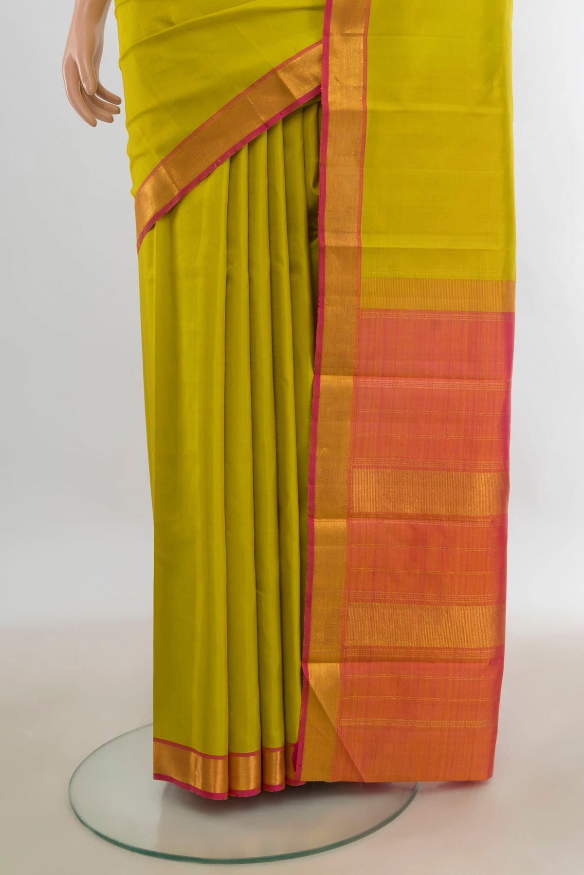 Pleats and pallu of Pure Silk Pure Zari Light Green Kanjivaram Saree with Plain Body and Silk Border. 