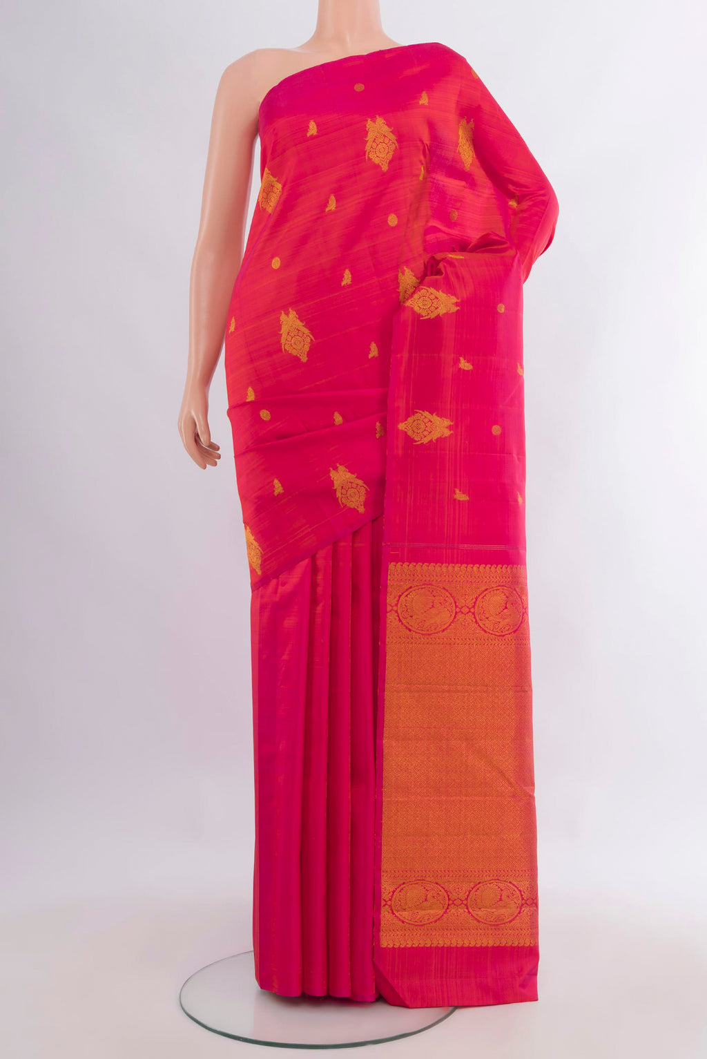 Pure Silk Pink Kanchipuram Saree with Zari Butta on the body and Without Border.  displayed on a mannequin
