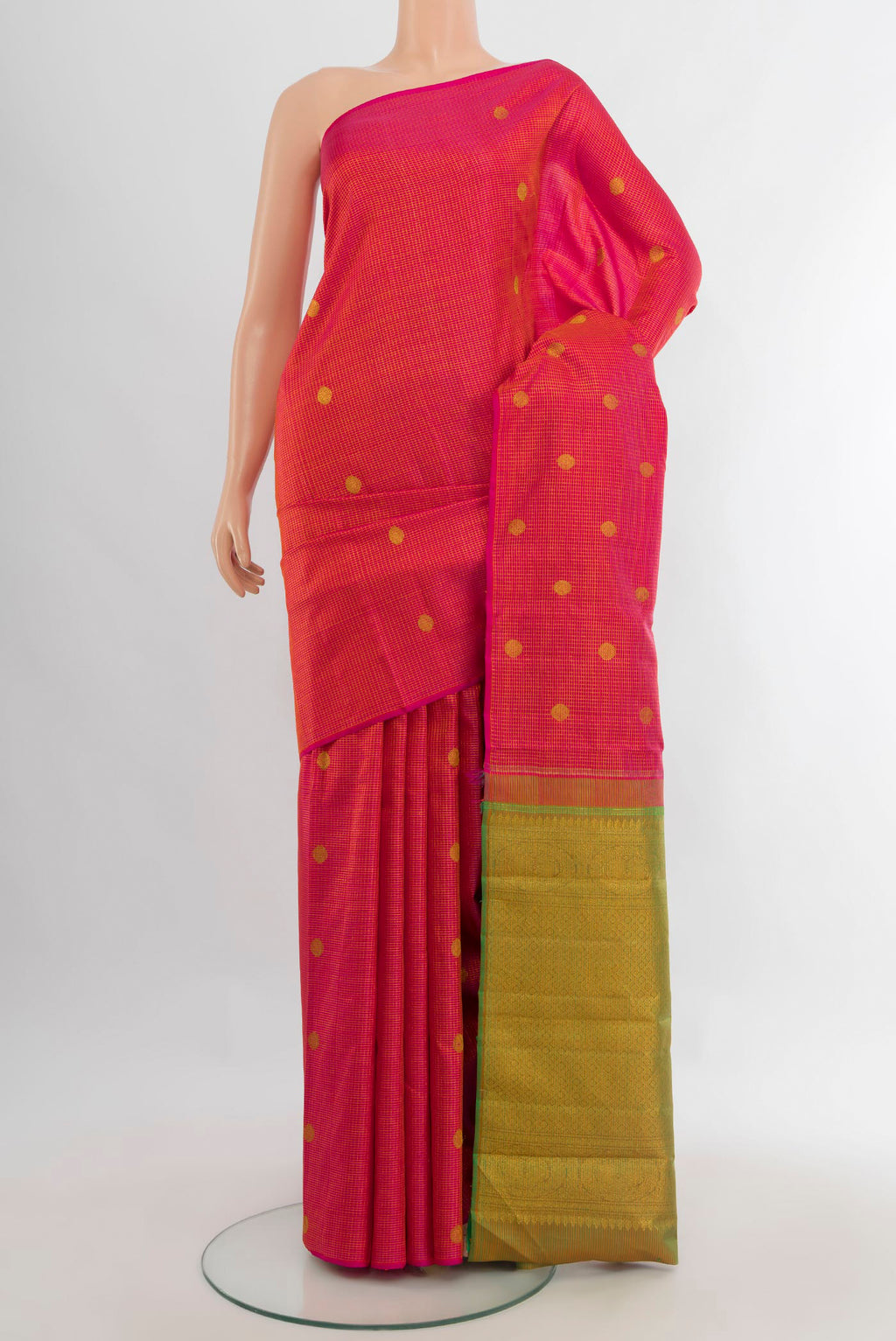 Pure Silk Pink Kanjivaram Saree with Zari Butta on the body and Without Border.  displayed on a mannequin