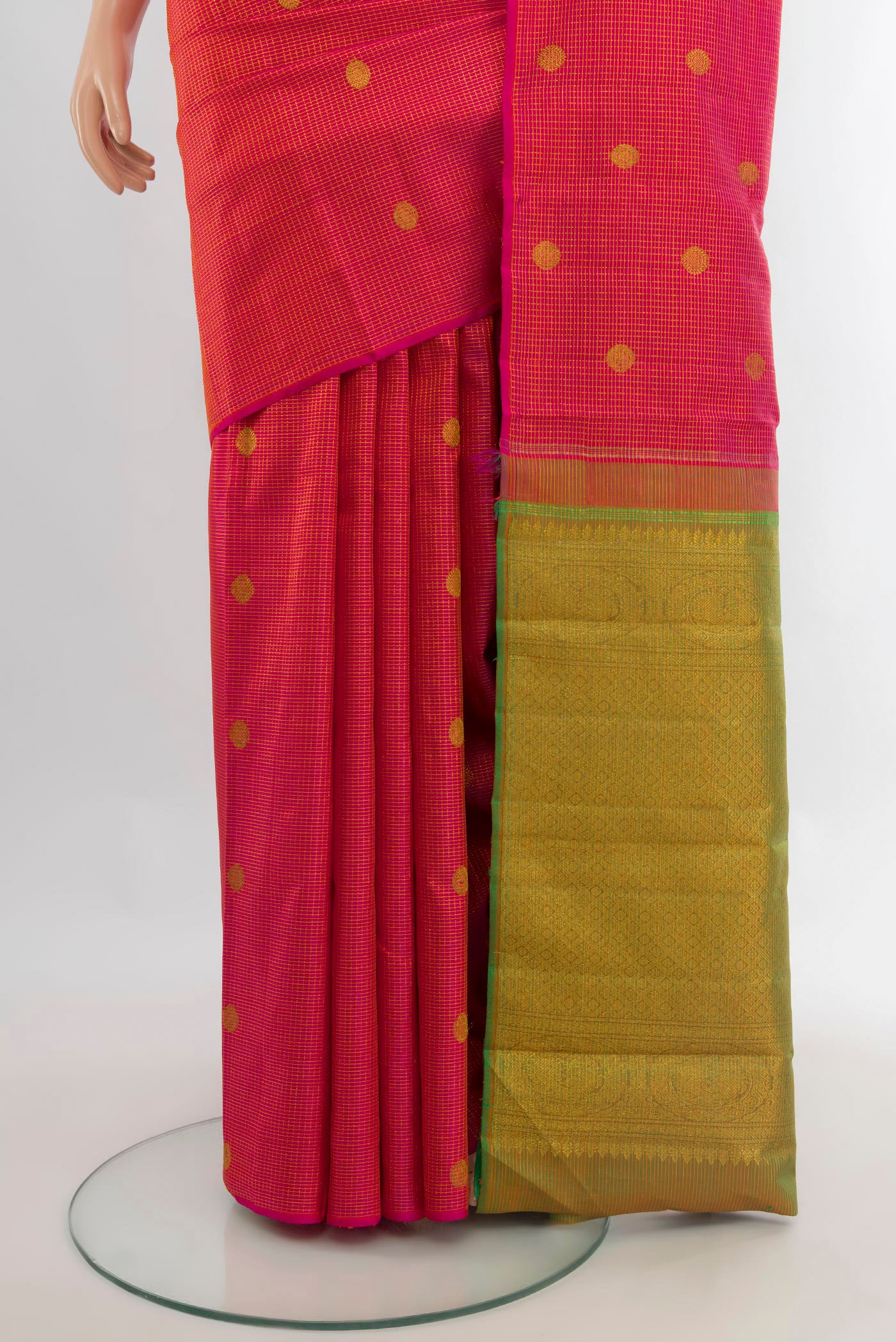 Pleats and pallu of Pure Silk Pink Kanjivaram Saree with Zari Butta on the body and Without Border. 