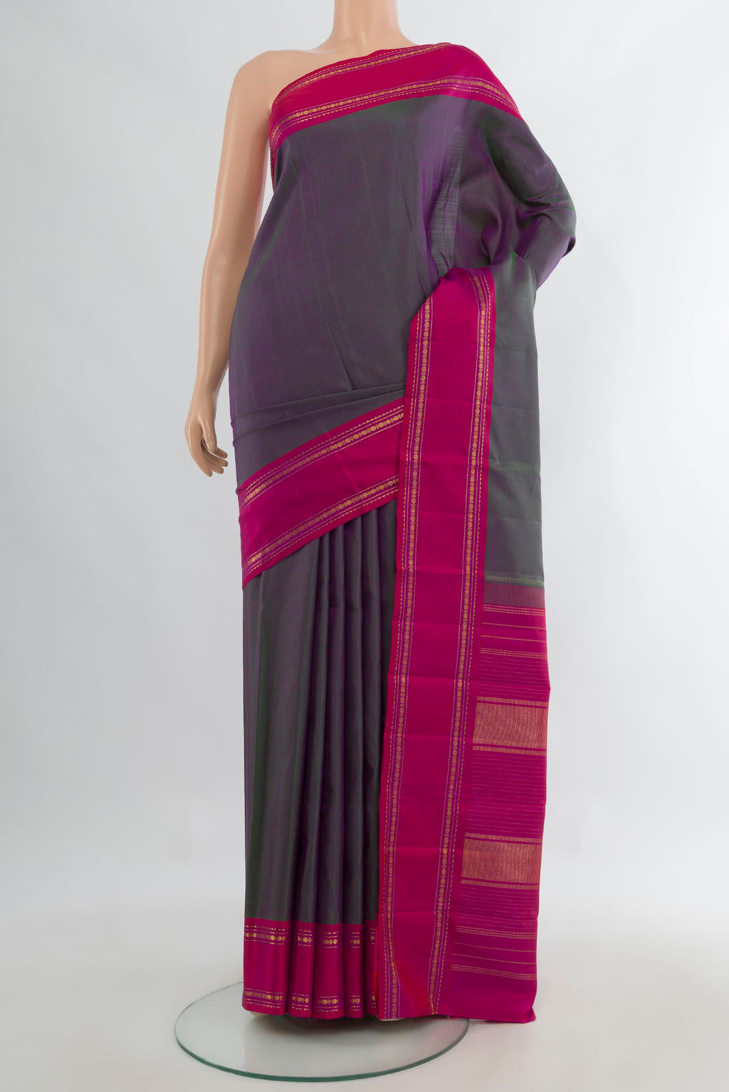 Pure Silk Purple Dual Tone Kanjivaram Saree with Plain Body and Plain Border.  displayed on a mannequin