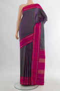 Pure Silk Purple Dual Tone Kanjivaram Saree with Plain Body and Plain Border.  displayed on a mannequin