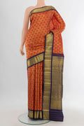 Pure Silk Red Kanchipuram Saree with Zari Brocade on the body and Zari Border.  displayed on a mannequin