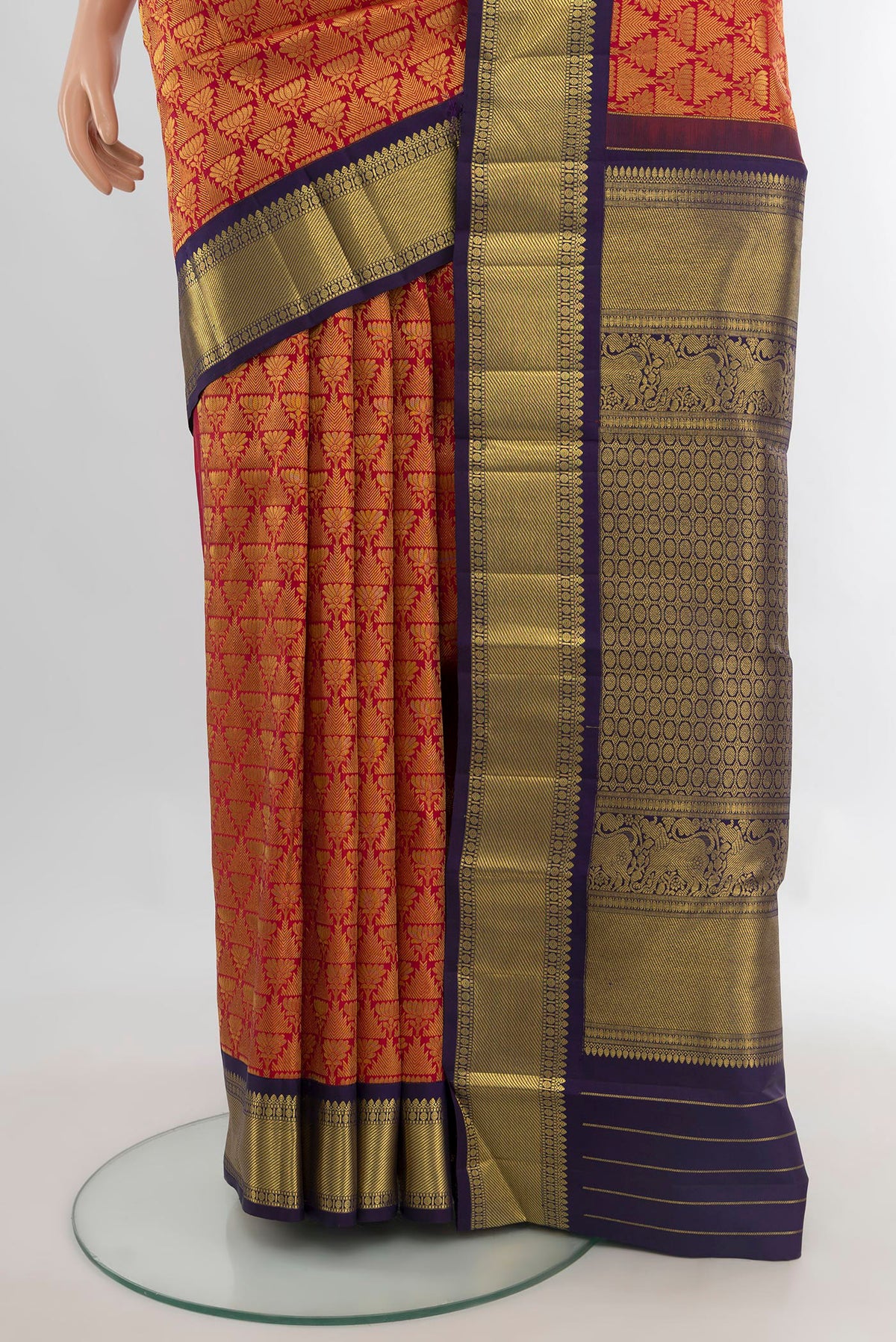 Pleats and pallu of Pure Silk Red Kanchipuram Saree with Zari Brocade on the body and Zari Border. 