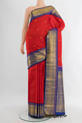 Pure Silk Pure Zari Red Kanchipuram Saree with Zari Butta on the body and Zari Border.  displayed on a mannequin