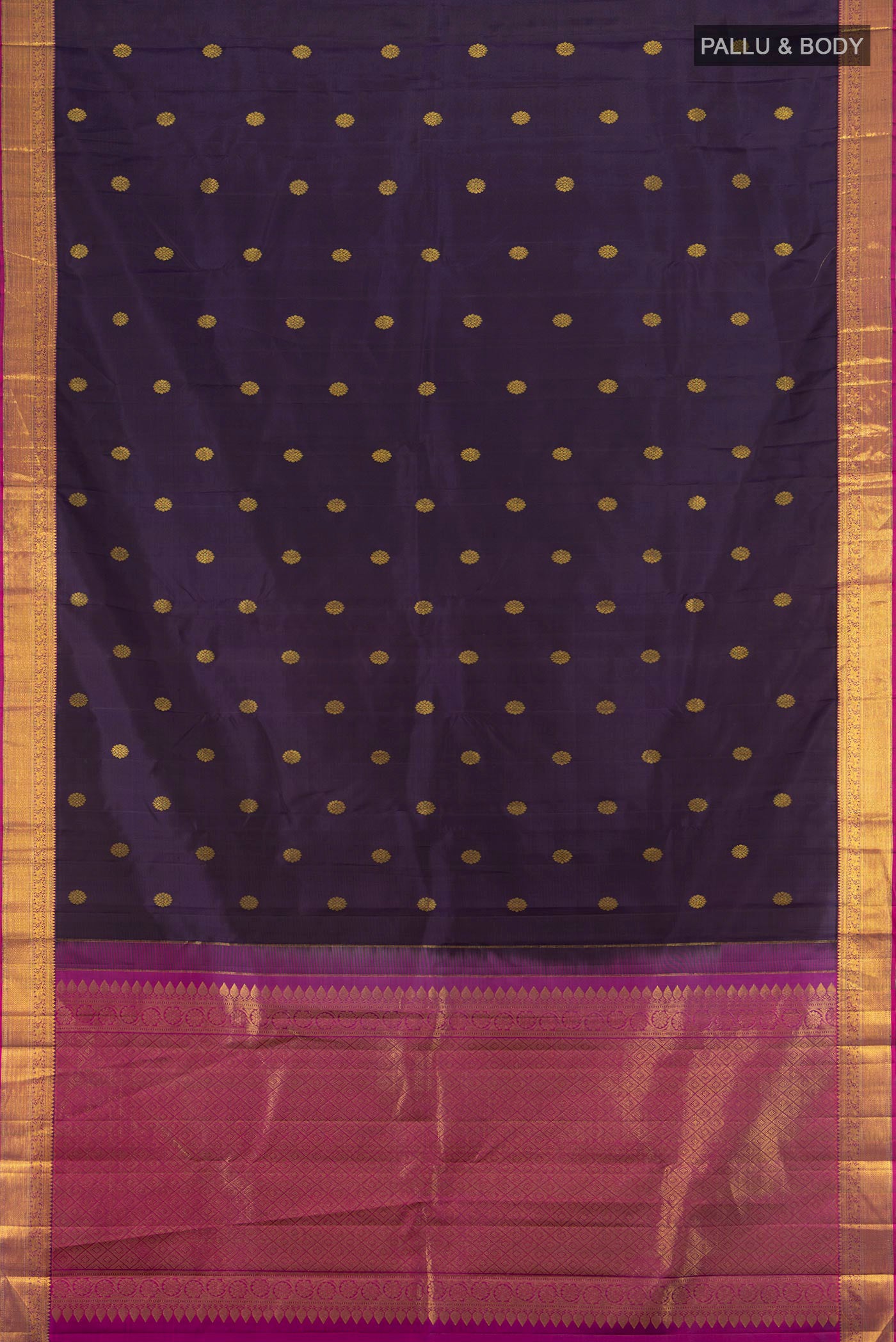 Flat view of Navy Blue Kanjivaram Silk Saree with Zari Butta on the body and Zari Border. 