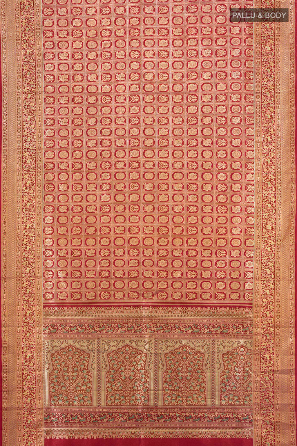 Flat view of Red Kanchipuram Tissue Silk Saree with Zari Brocade on the body and Zari Border. 