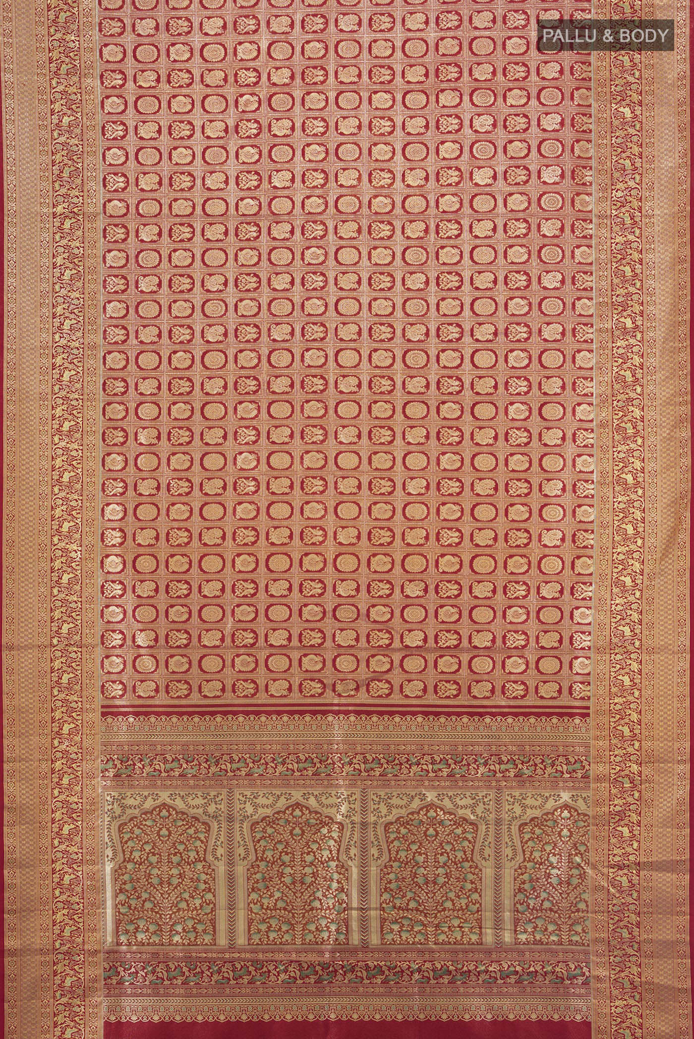 Flat view of Red Kanchipuram Tissue Silk Saree with Zari Brocade on the body and Zari Border. 
