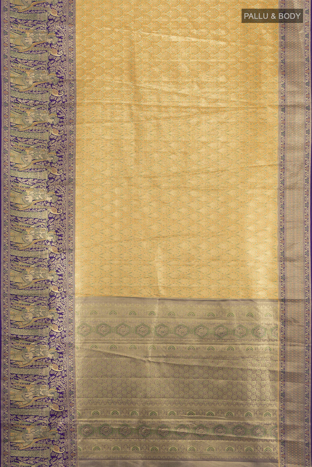 Flat view of Golden Kanchipuram Tissue Silk Saree with Zari Brocade on the body and Zari Border. 