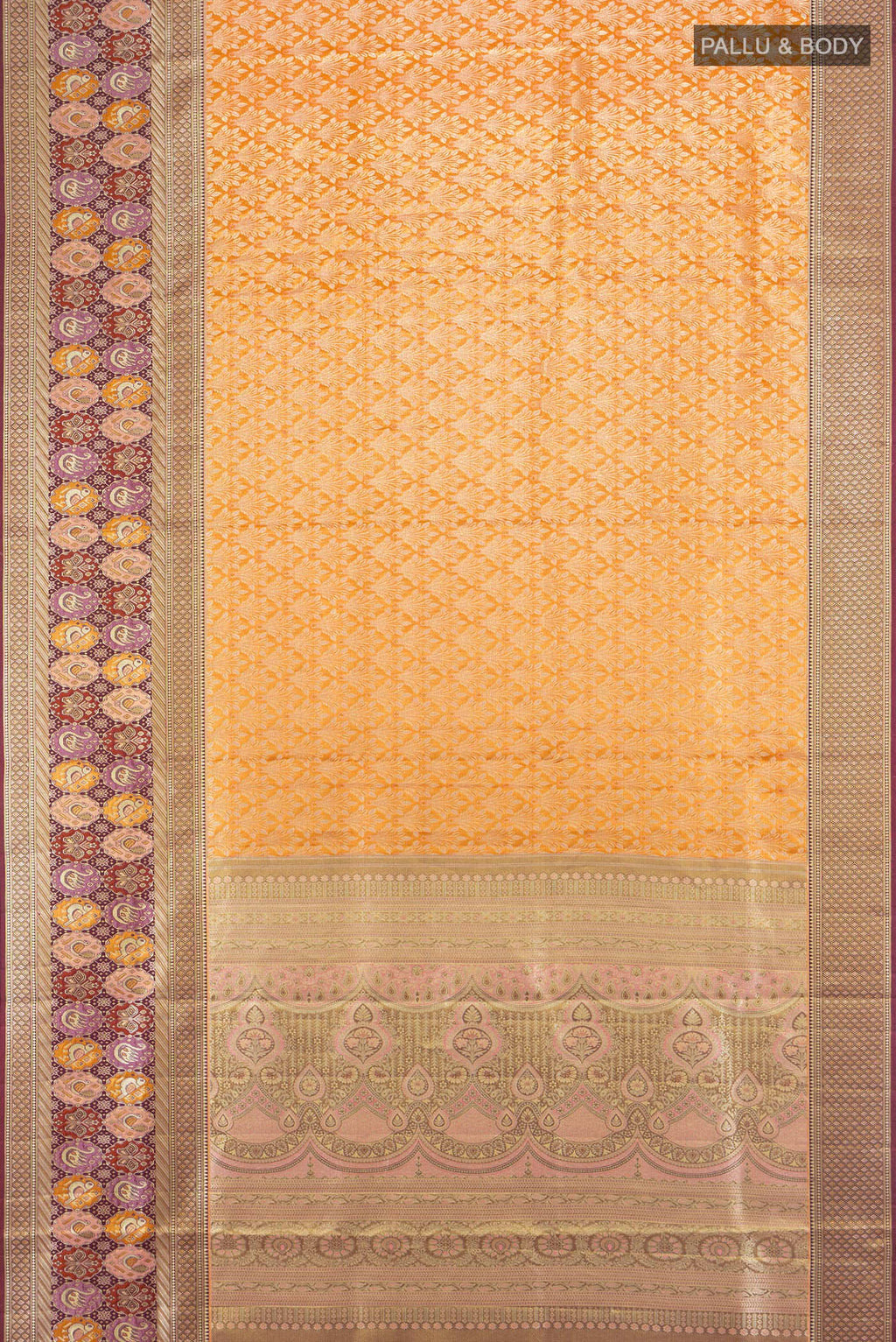Flat view of Mustard Kanchipuram Tissue Silk Saree with Zari Brocade on the body and Fancy Border. 