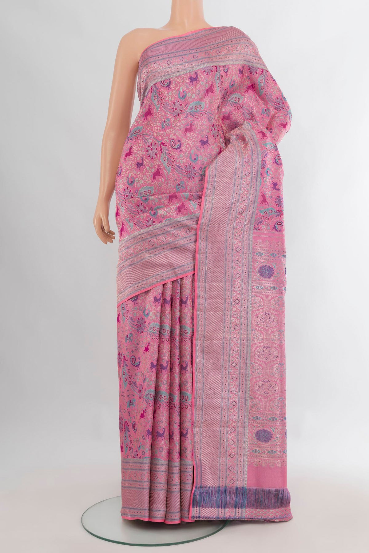 Pure Silk Rose pink Kanchipuram Saree with Zari Butta on the body and Zari Border.  displayed on a mannequin