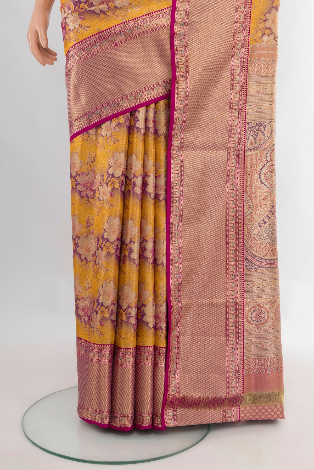 Pleats and pallu of Pure Silk Yellow Kanchipuram Saree with Zari Brocade on the body and Zari Border. 