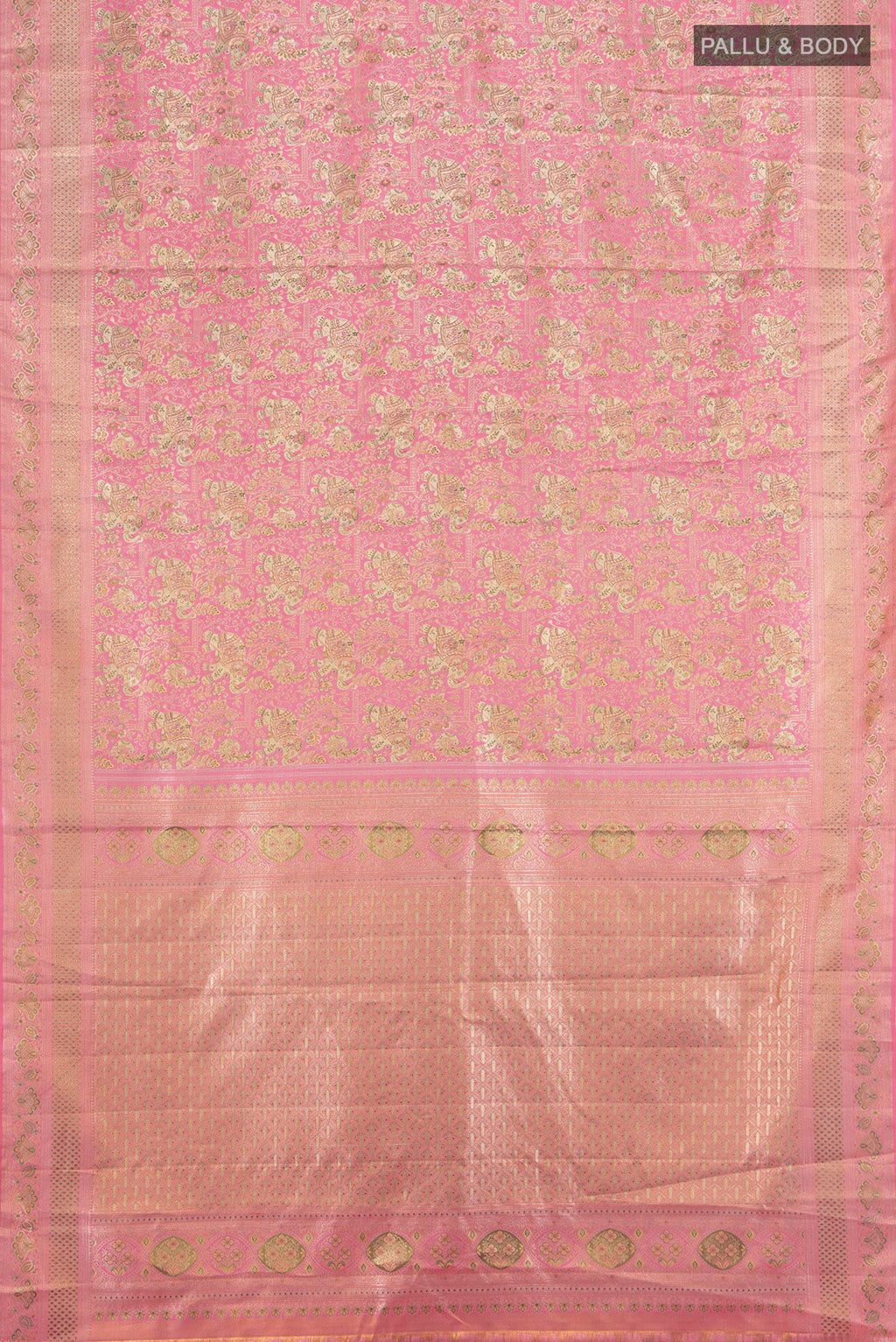 Flat view of Rose pink Kanchipuram Tissue Silk Saree with Zari Brocade on the body and Zari Border. 