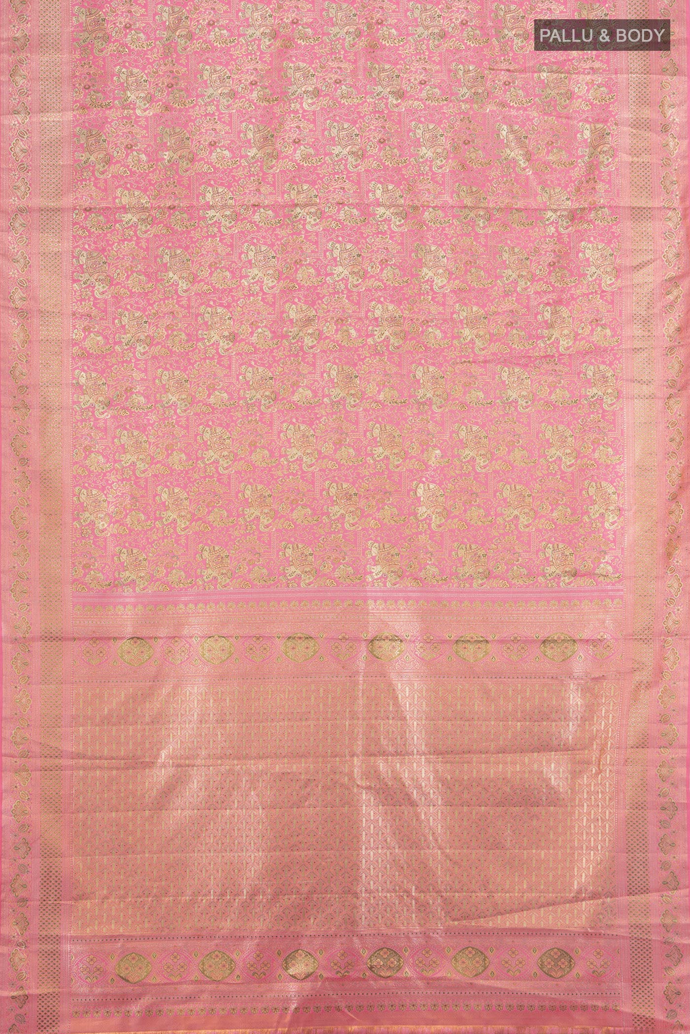 Flat view of Rose pink Kanchipuram Tissue Silk Saree with Zari Brocade on the body and Zari Border. 