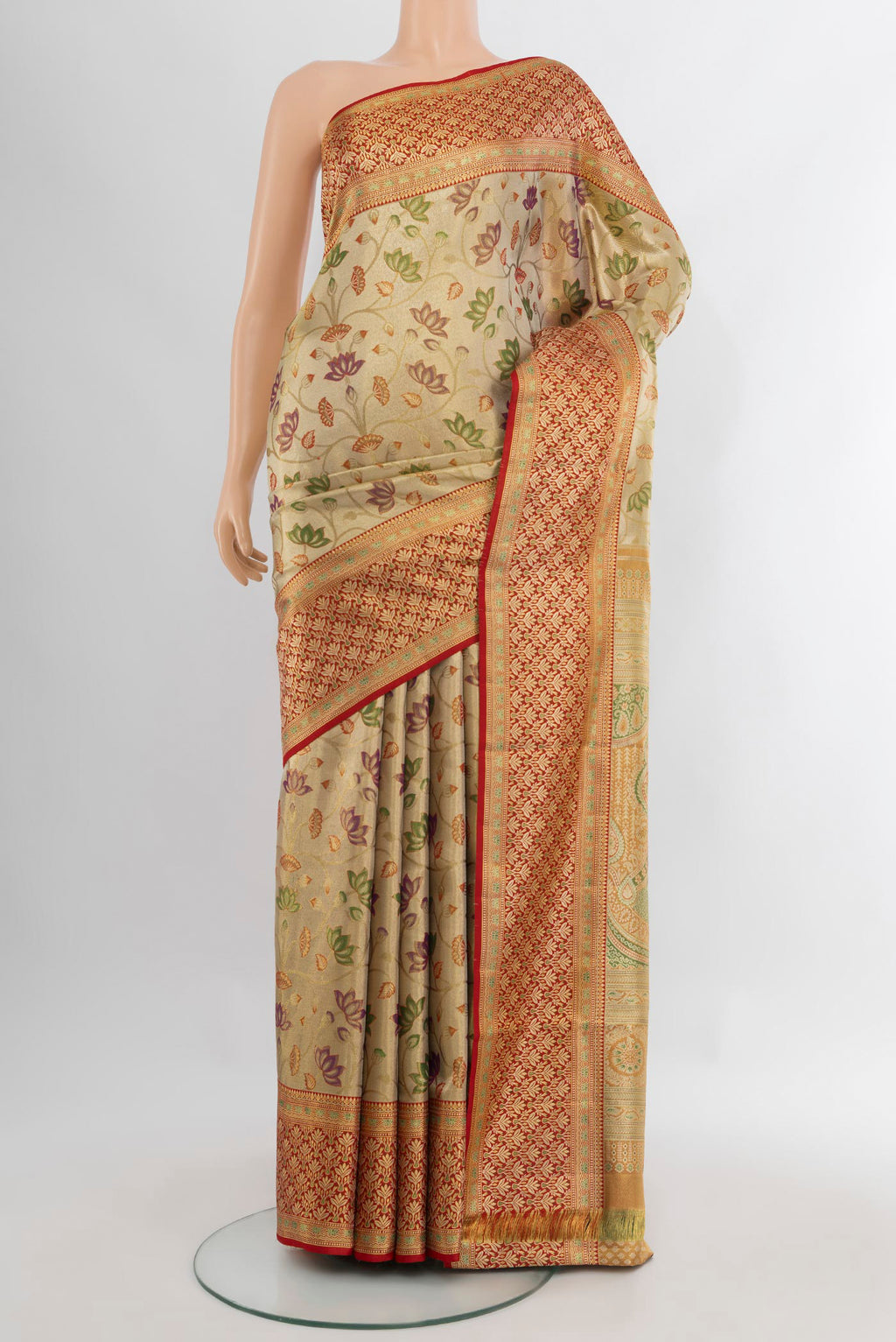 Golden Kanchipuram Tissue Silk Saree with Zari Brocade on the body and Zari Border.  displayed on a mannequin