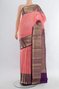 Rose pink Kanchipuram Silk Saree with Zari Brocade on the body and Zari Border.  displayed on a mannequin