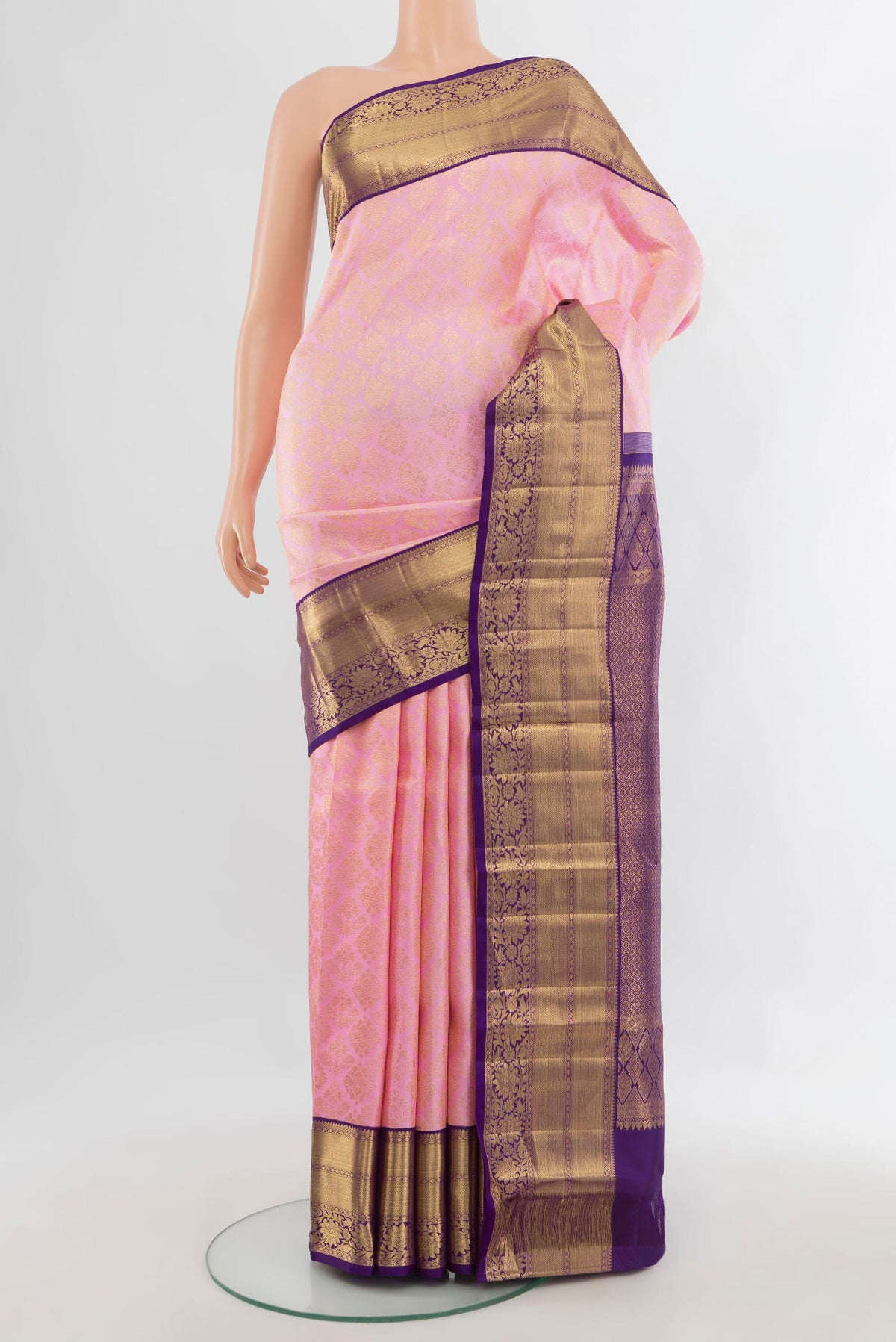Pure Silk Rose pink Kanchipuram Saree with Zari Brocade on the body and Zari Border.  displayed on a mannequin