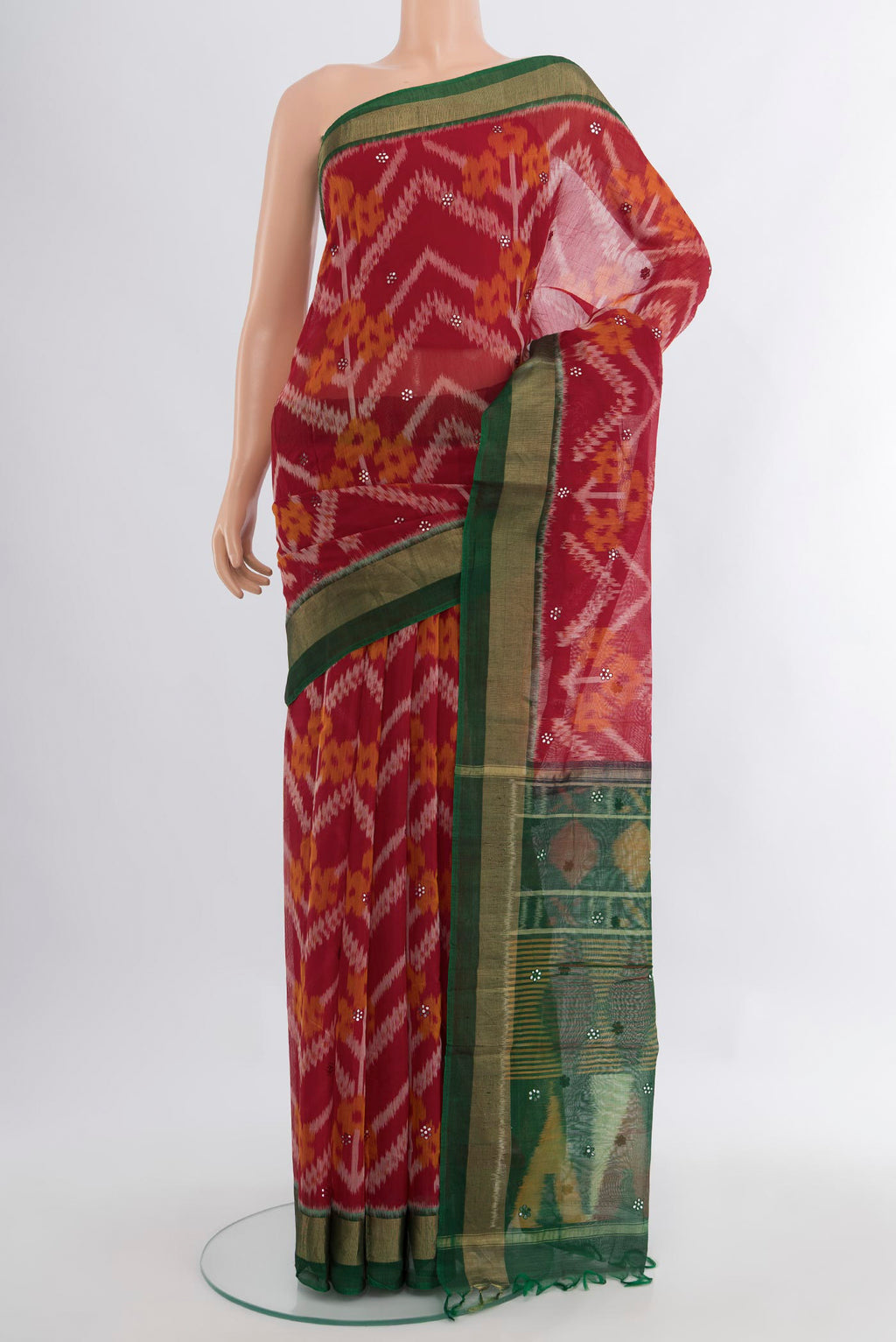 Multi Color Kora Cotton Saree with Ikat Print on the body and Silk Border.  displayed on a mannequin