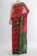 Multi Color Kora Cotton Saree with Ikat Print on the body and Silk Border.  displayed on a mannequin