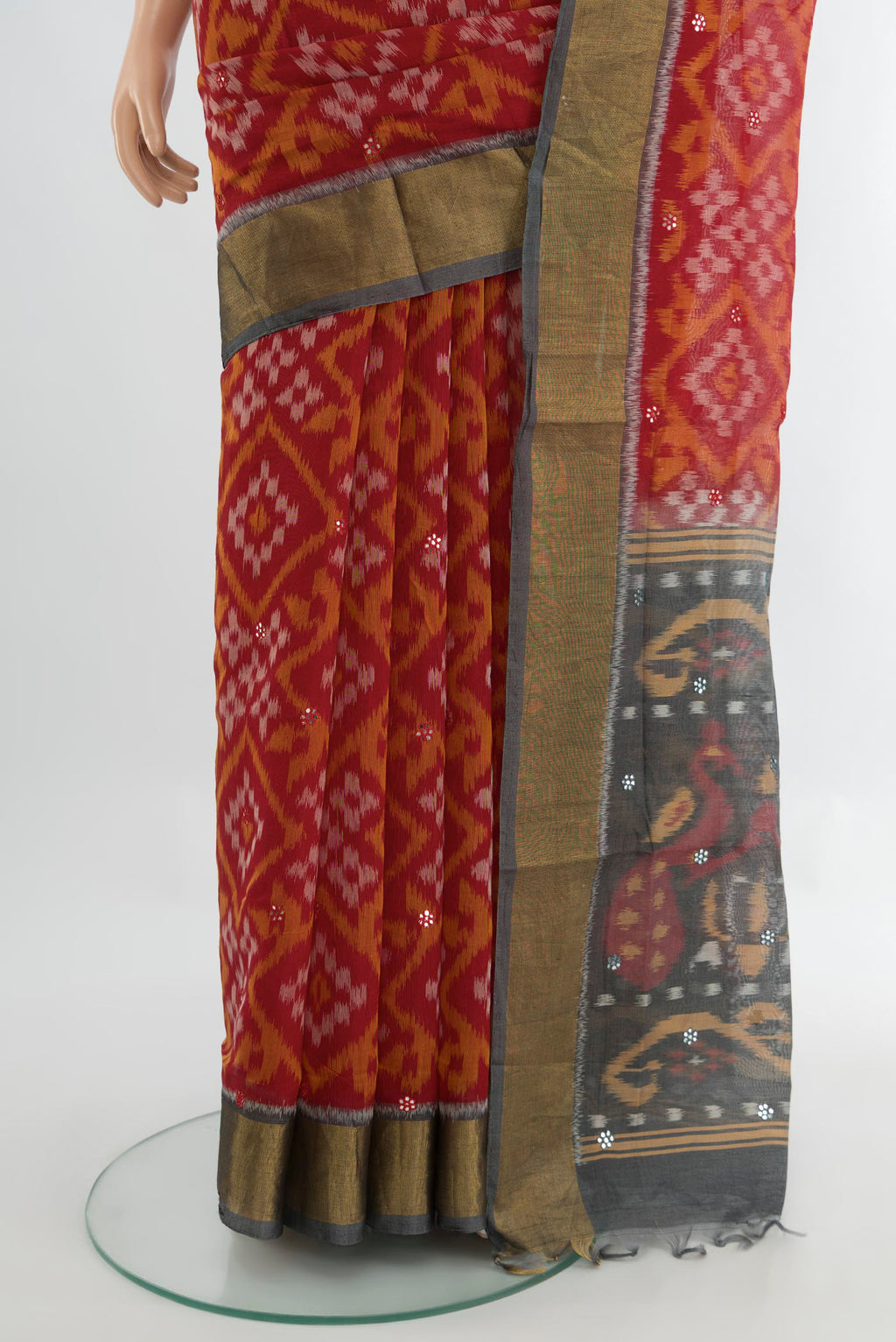 Pleats and pallu of Multi Color Kora Cotton Saree with Ikat Print on the body and Silk Border. 