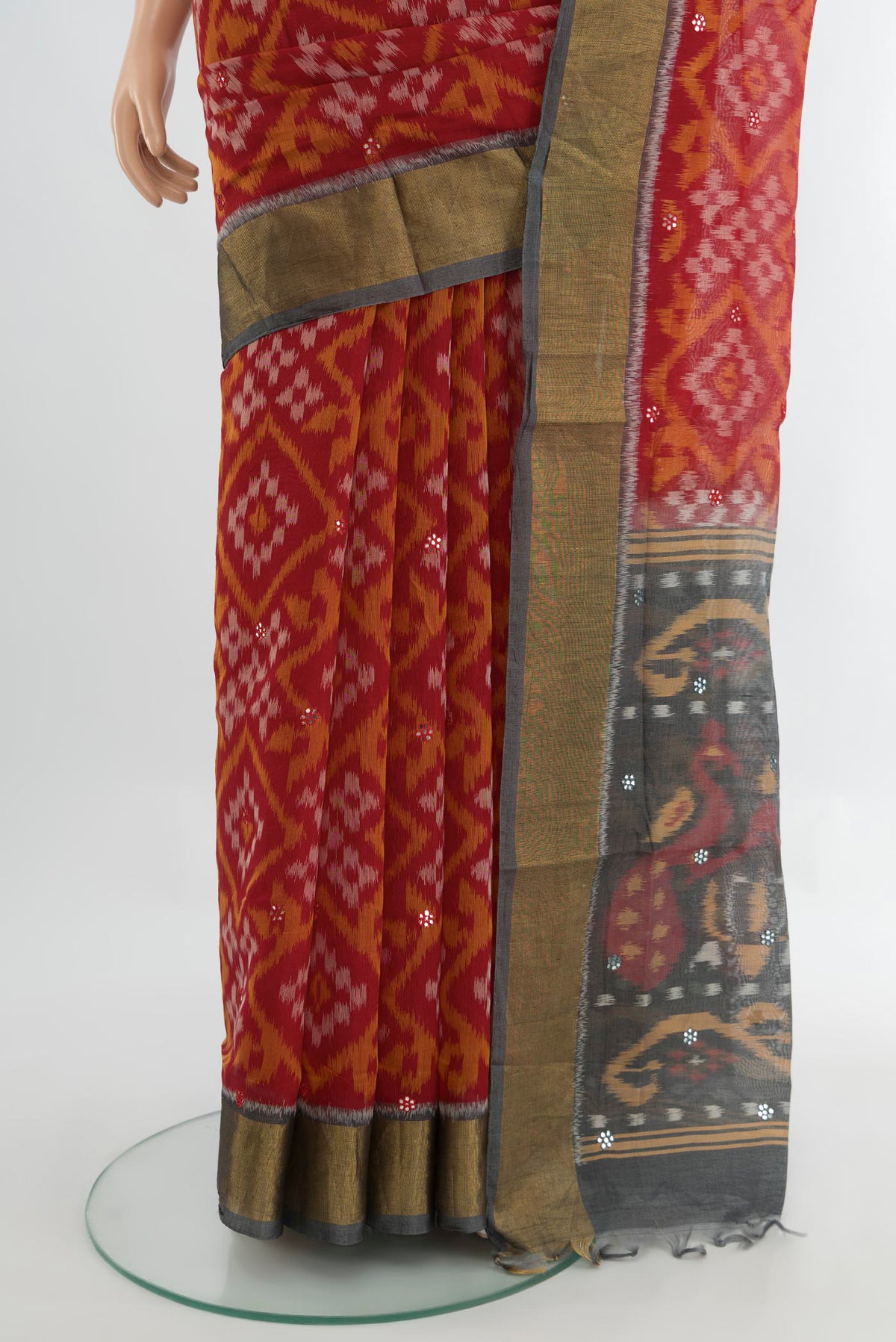 Pleats and pallu of Multi Color Kora Cotton Saree with Ikat Print on the body and Silk Border. 